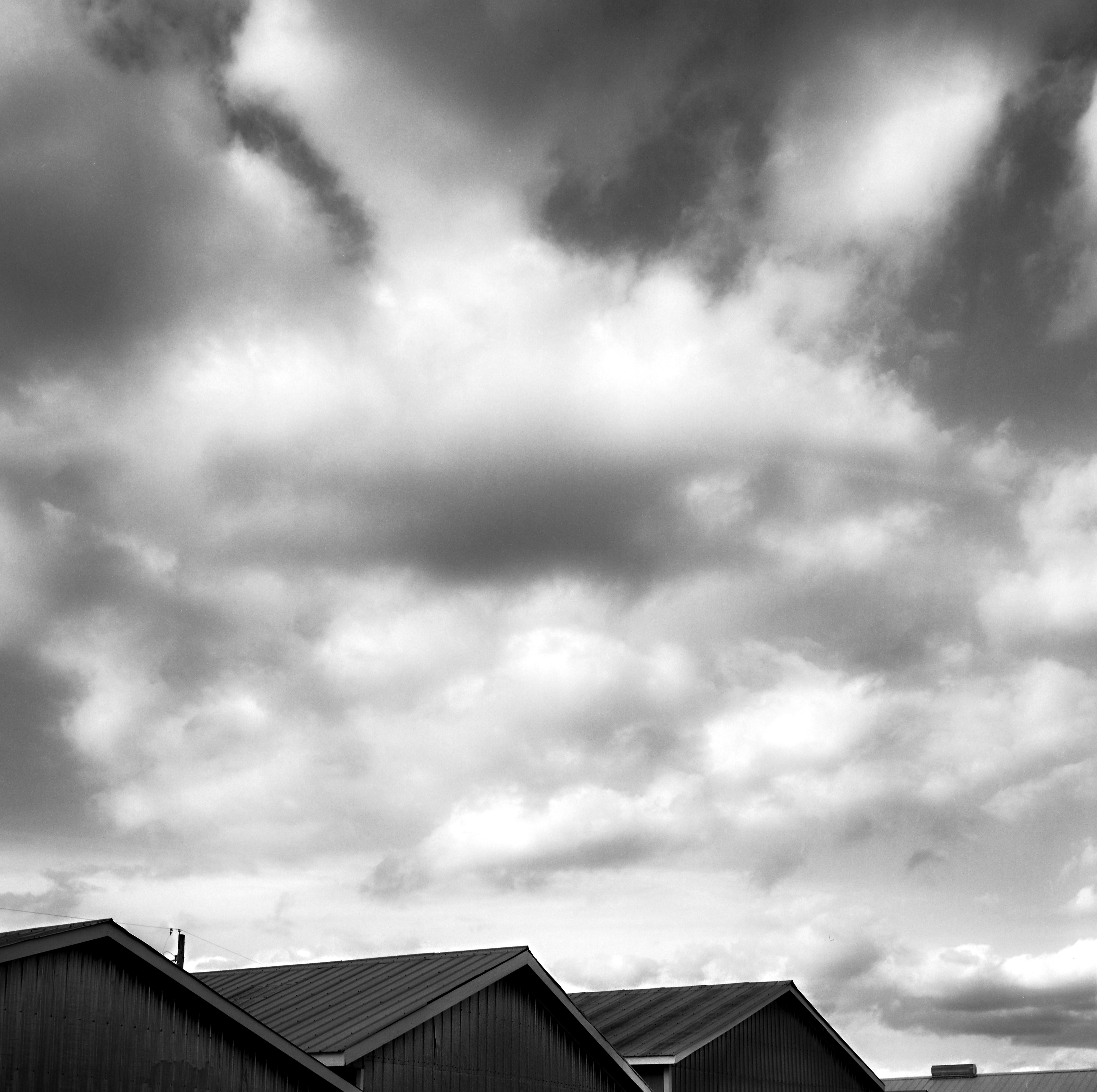 Clouds Over Iroquois Boat Houses - 120 film Distance movements in the heart feel like magnetic polarisation across time.