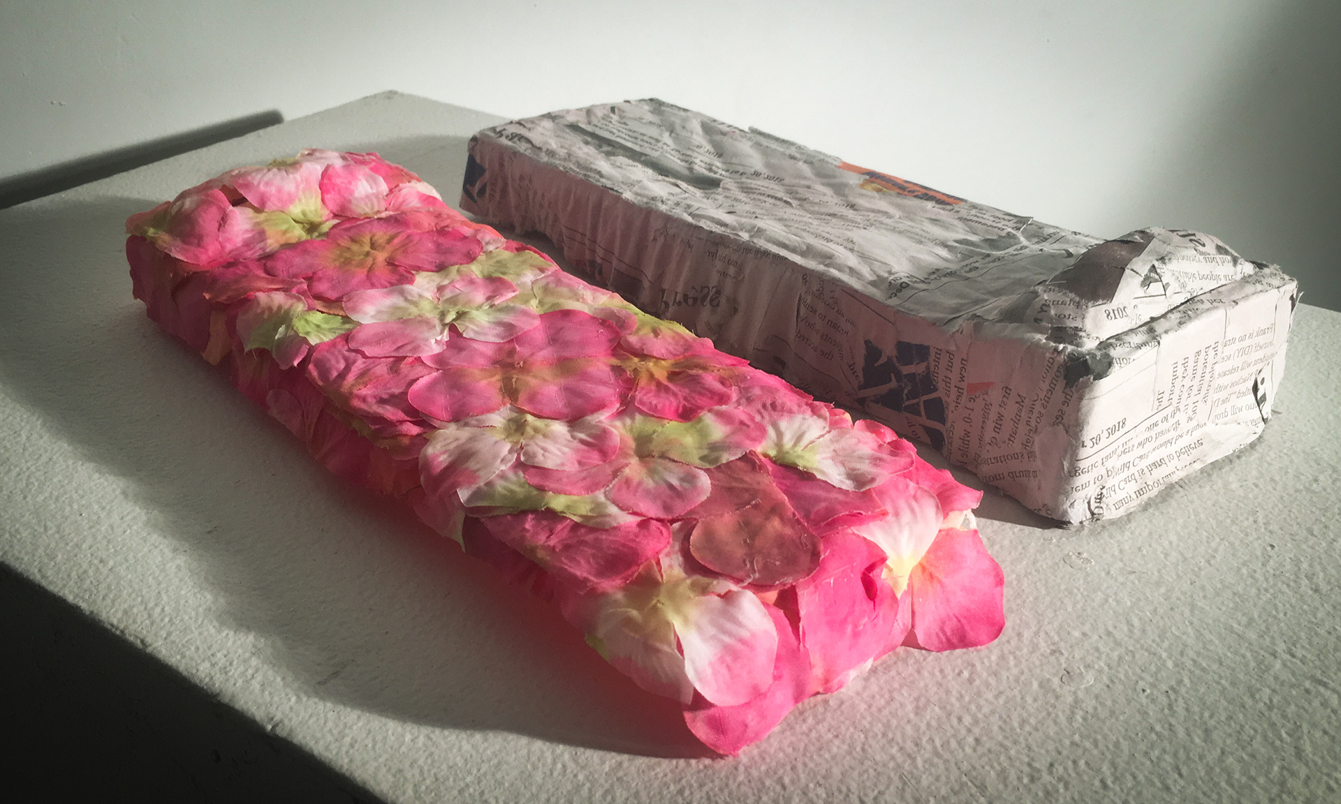 Newsprint, Fake Flowers cast as Beds