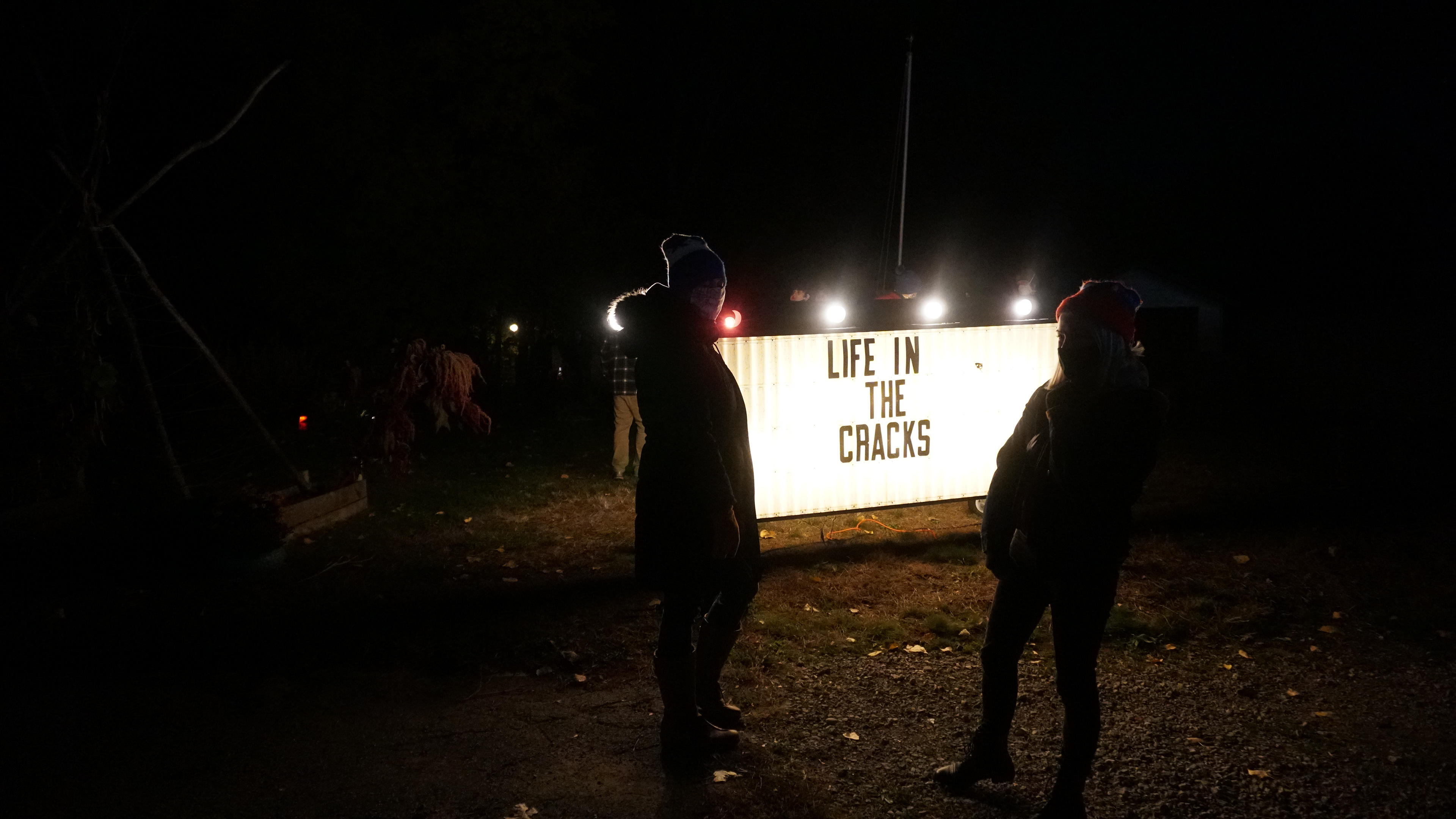 Life in the Cracks exhibition sign