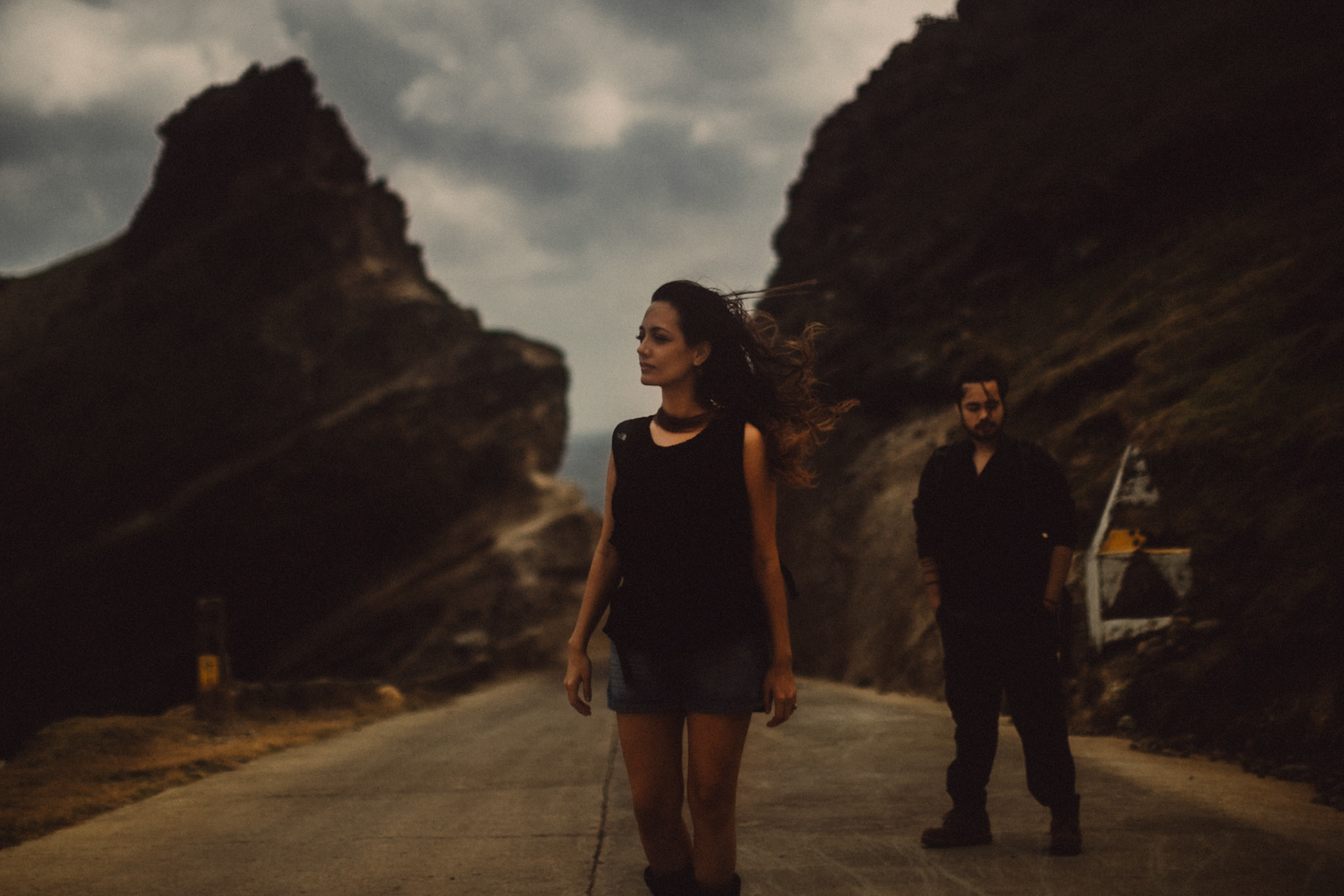 Backpacker adventure couple portraits at the Alapad Rock Formation, Batanes, Philippines, Southeast Asia, November 2014, Canon EOS 6D.