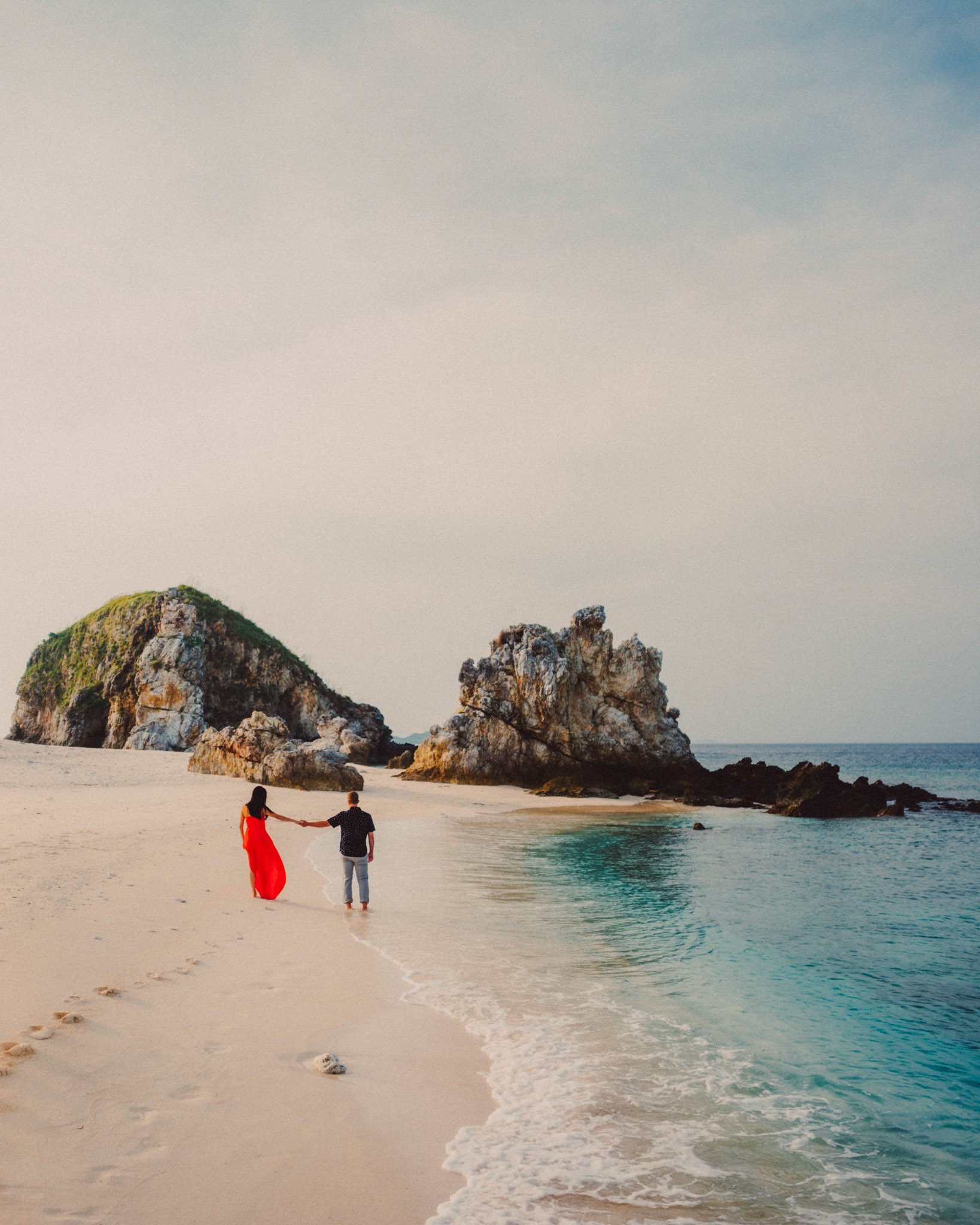 Couple portraits on a white sand beach, Renaud and Kat's island hopping adventure session in Malpagalen Island, Club Paradise, Coron, Palawan, Philippines, Southeast Asia, August 2018, Leica M