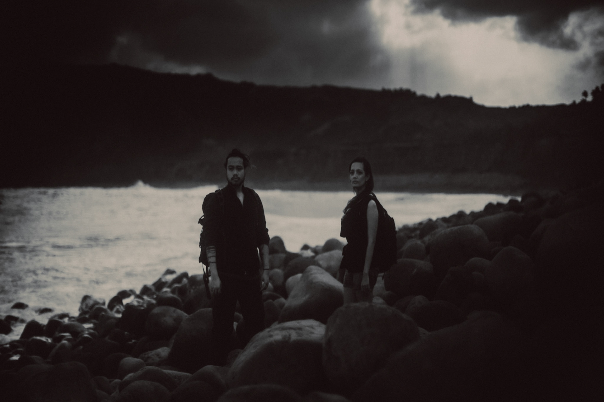 Moody adventure couple portraits in Valugan Boulder Beach, Basco, Batanes, Philippines, Southeast Asia, November 2014, Canon EOS 6D.