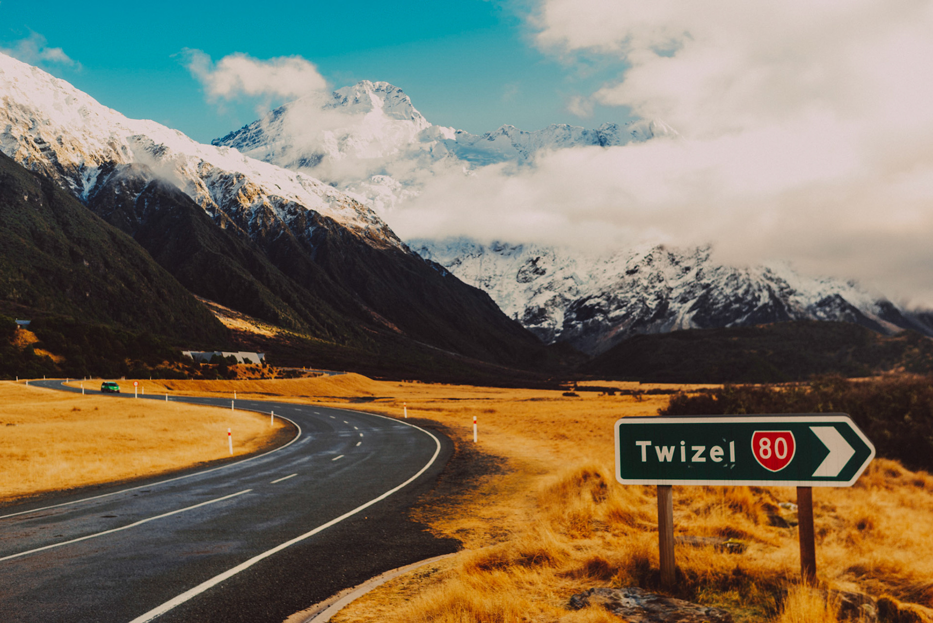 Snow-capped mountain tops and a winding road in Twizel, Canterbury, New Zealand, June 2017, Leica M.