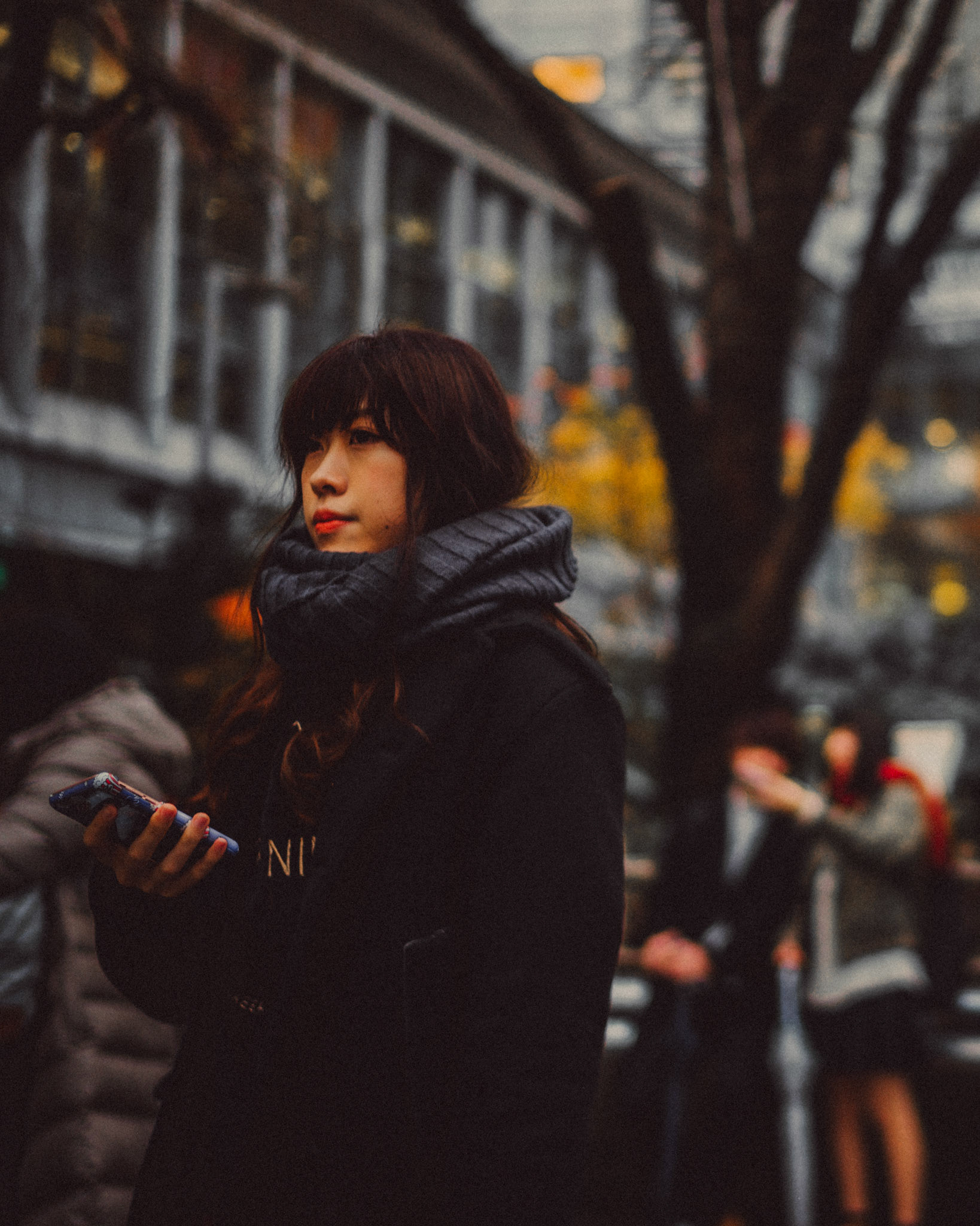 A Japanese girl in Shibuya Station, Tokyo, Japan, December 2016, Leica M.