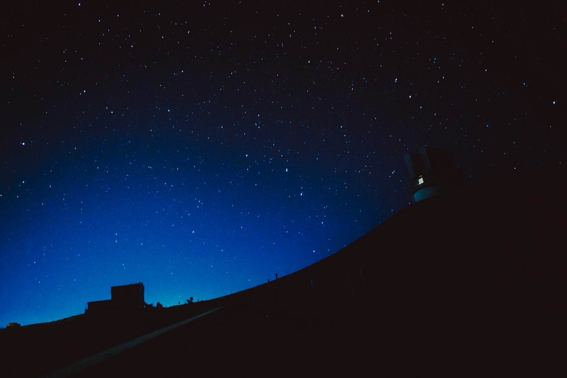 Subaru Telescope's silhouette against the early evening sky, Kona, Hawaii, USA, September 2015, Sony A7S.