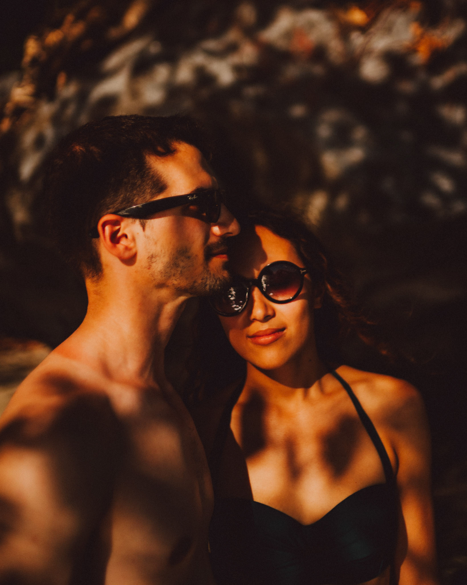 Moody, shadowy couple portraits in Paradise Beach, Cadlao Island, El Nido, Palawan, Philippines, Southeast Asia, April 2019, Sony A7III.