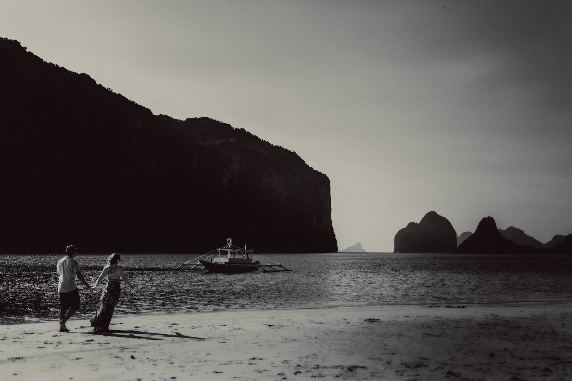 Moody black and white couple photos on the sandbar behind Lagen Island, from Peter &amp; Alexis' adventure pre wedding in El Nido, Palawan, Philippines, Southeast Asia, April 2018, Sony A7SII