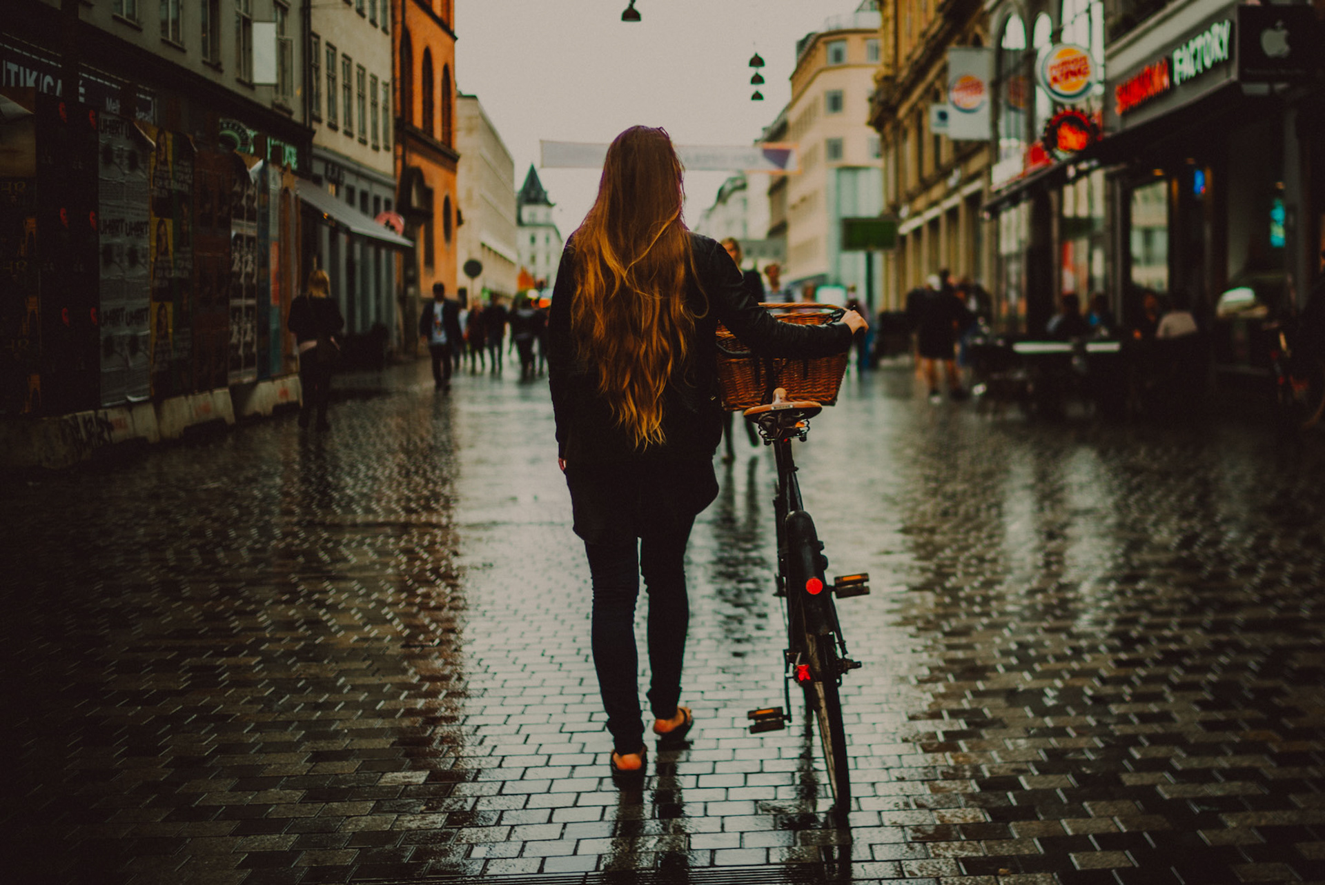 A girl walking her bicylcle in Strøget, Copenhagen, Denmark, July 2017, Leica M.
