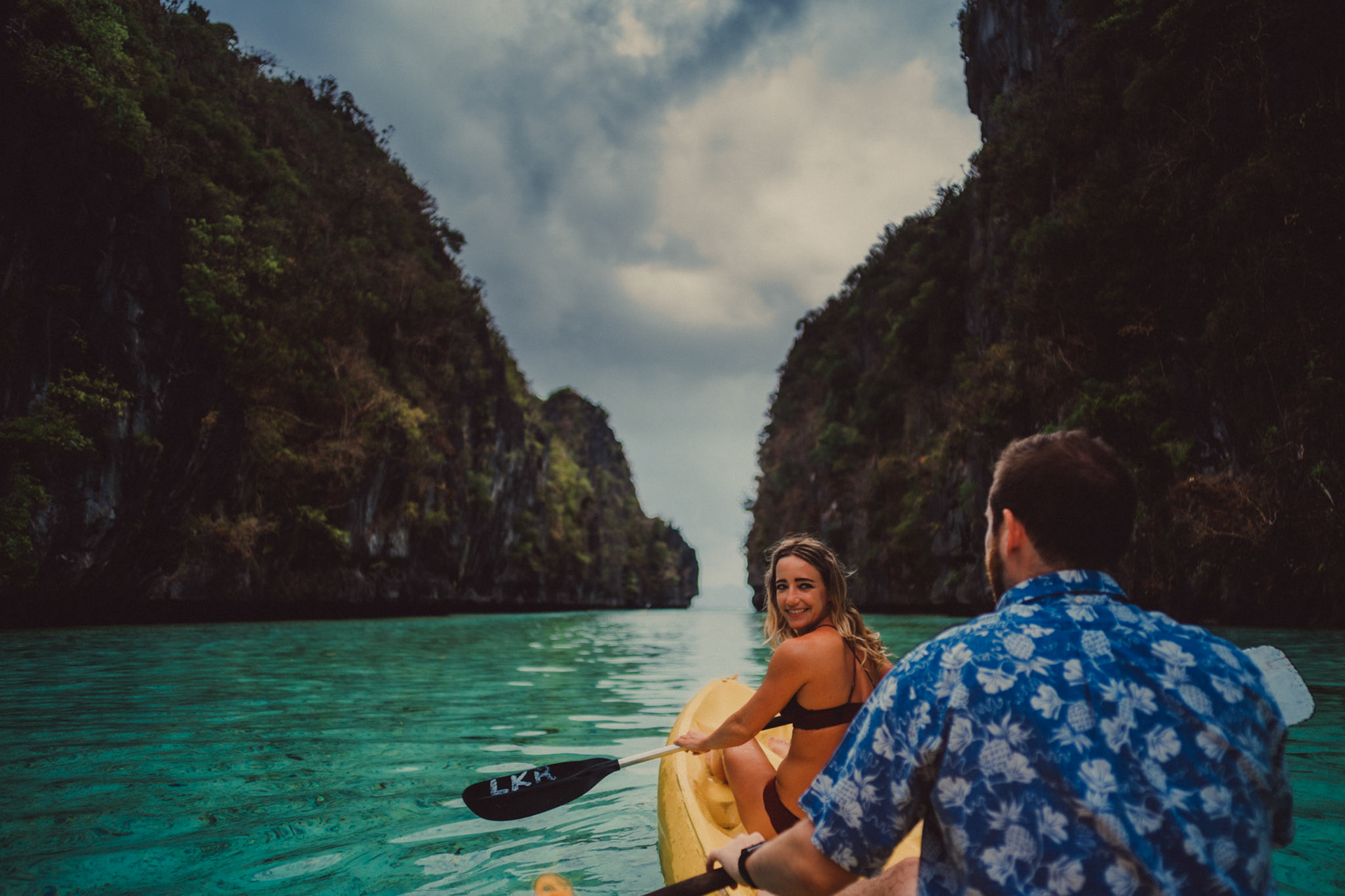 A couple kayaking in an empty Big Lagoon in Miniloc Island, El Nido, Palawan, Philippines, Southeast Asia, March 2019, Sony A7III.