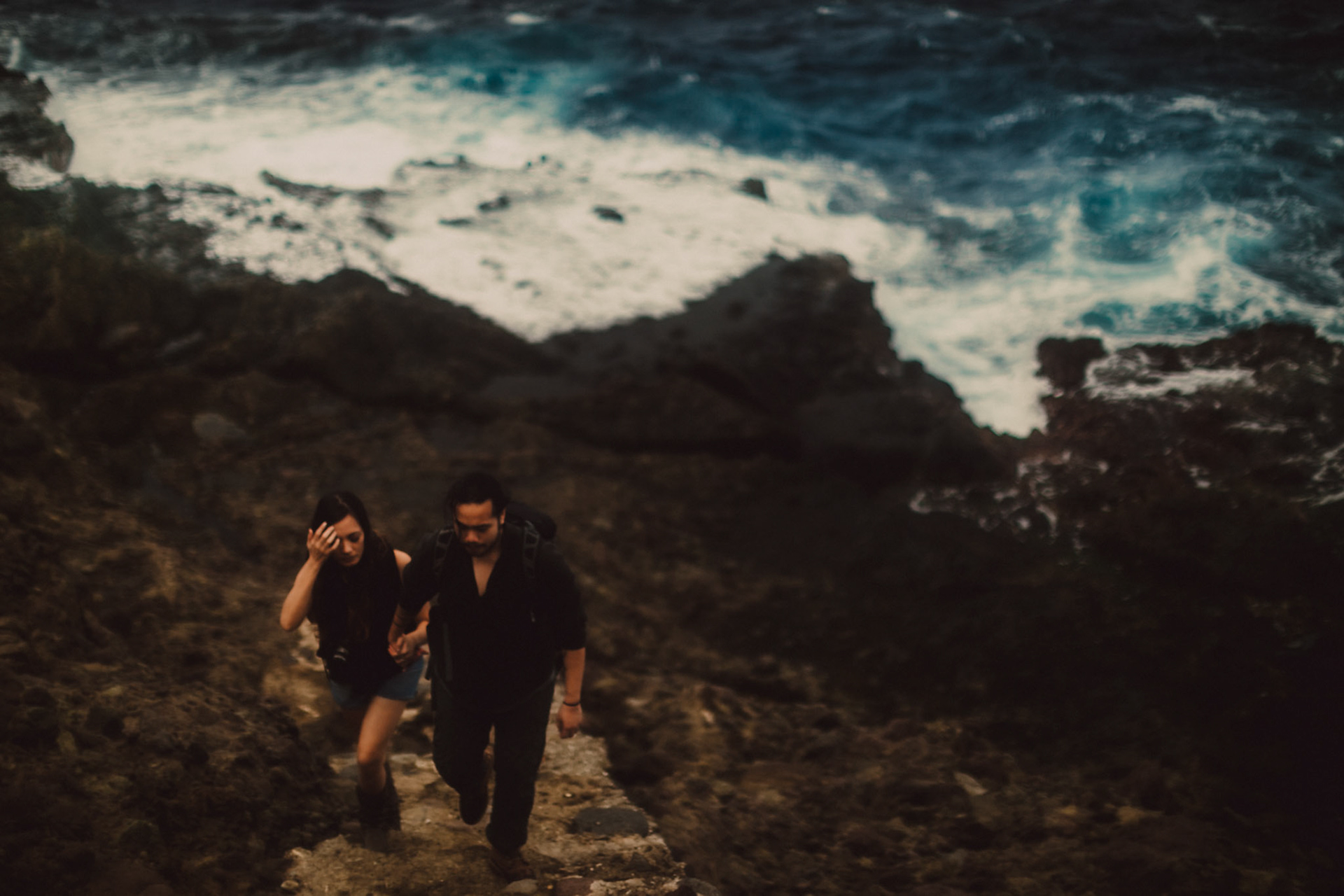 Backpacker adventure portraits on a rocky coast below Chawa View Deck in Mahatao, Batanes, Philippines, Southeast Asia, November 2014, Canon EOS 6D.
