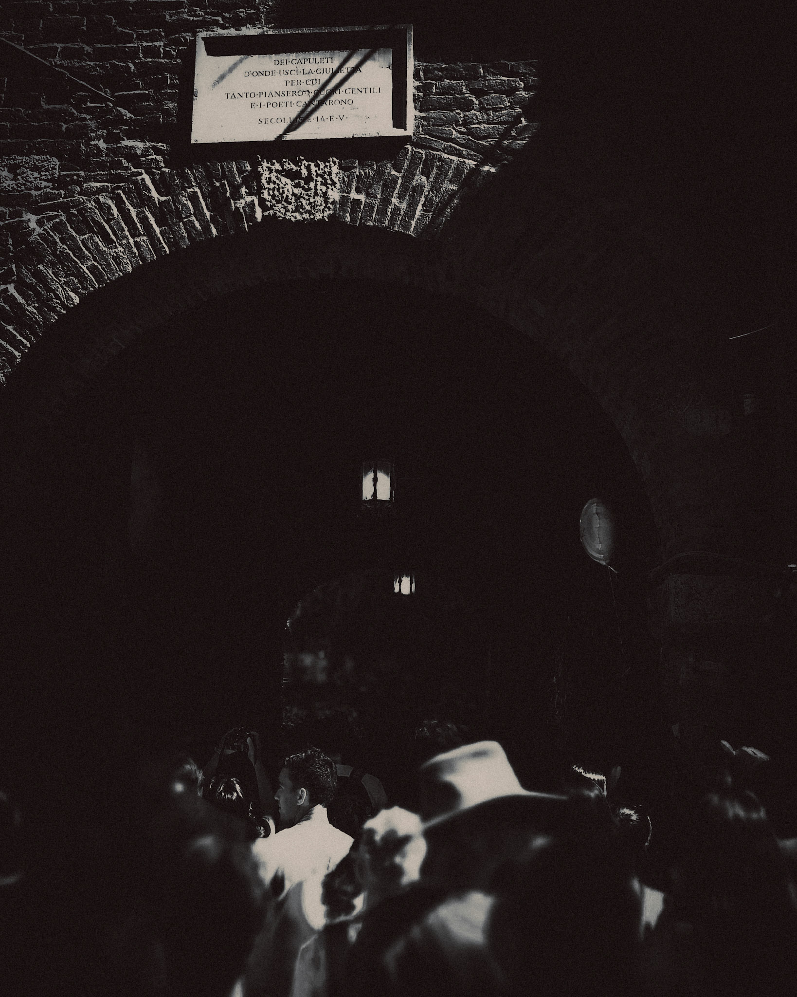 A man illuminated with the afternoon sun, Casa di Giulietta, Verona, Italy, September 2017, Huawei Mate 9 Pro.