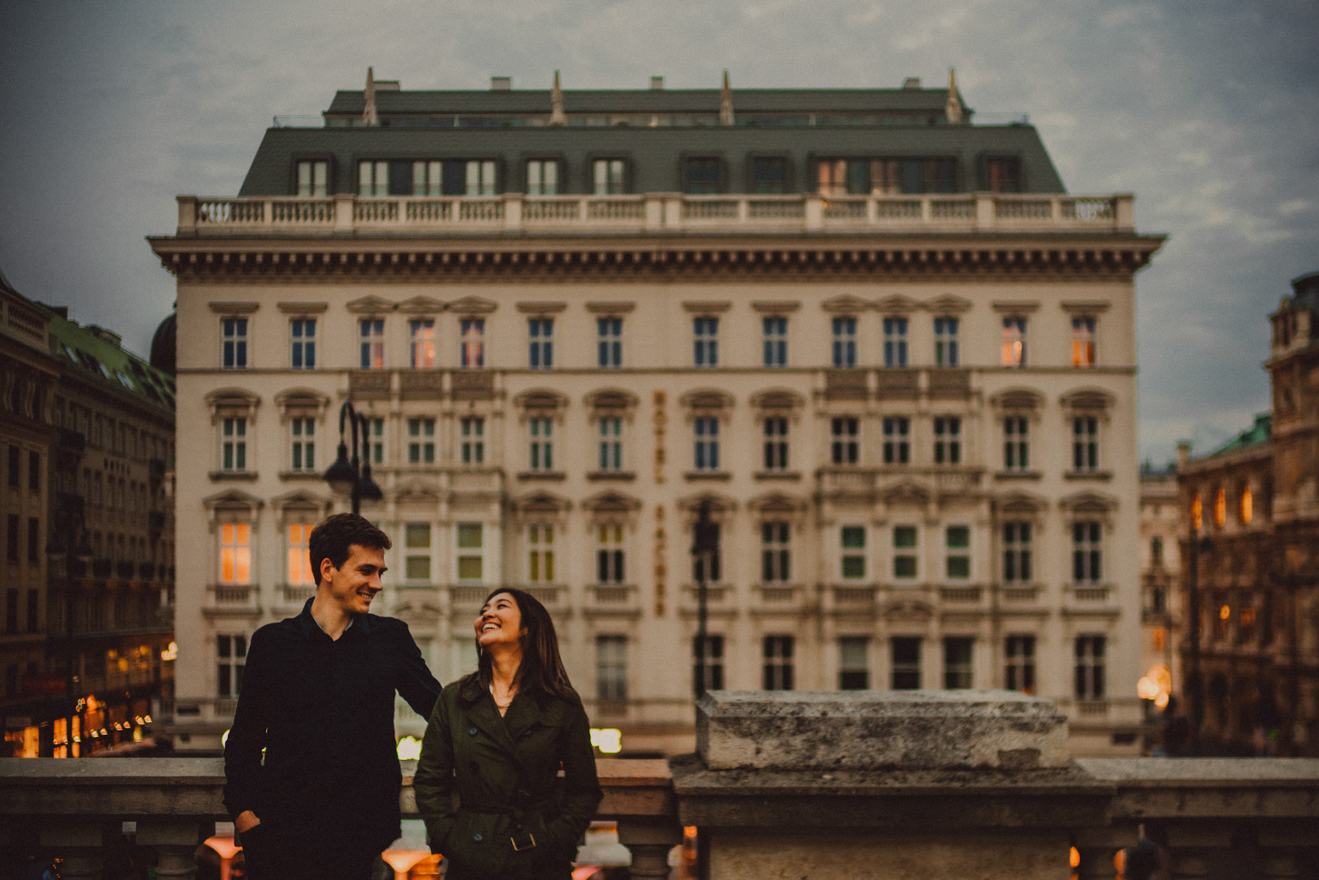 Casual destination engagement photos inspired by "Before Sunrise" movie locations, Albertina Museum with Hotel Sacher in the background, Innere Stadt, Vienna, Austria, August 2017, SonyA7RII.