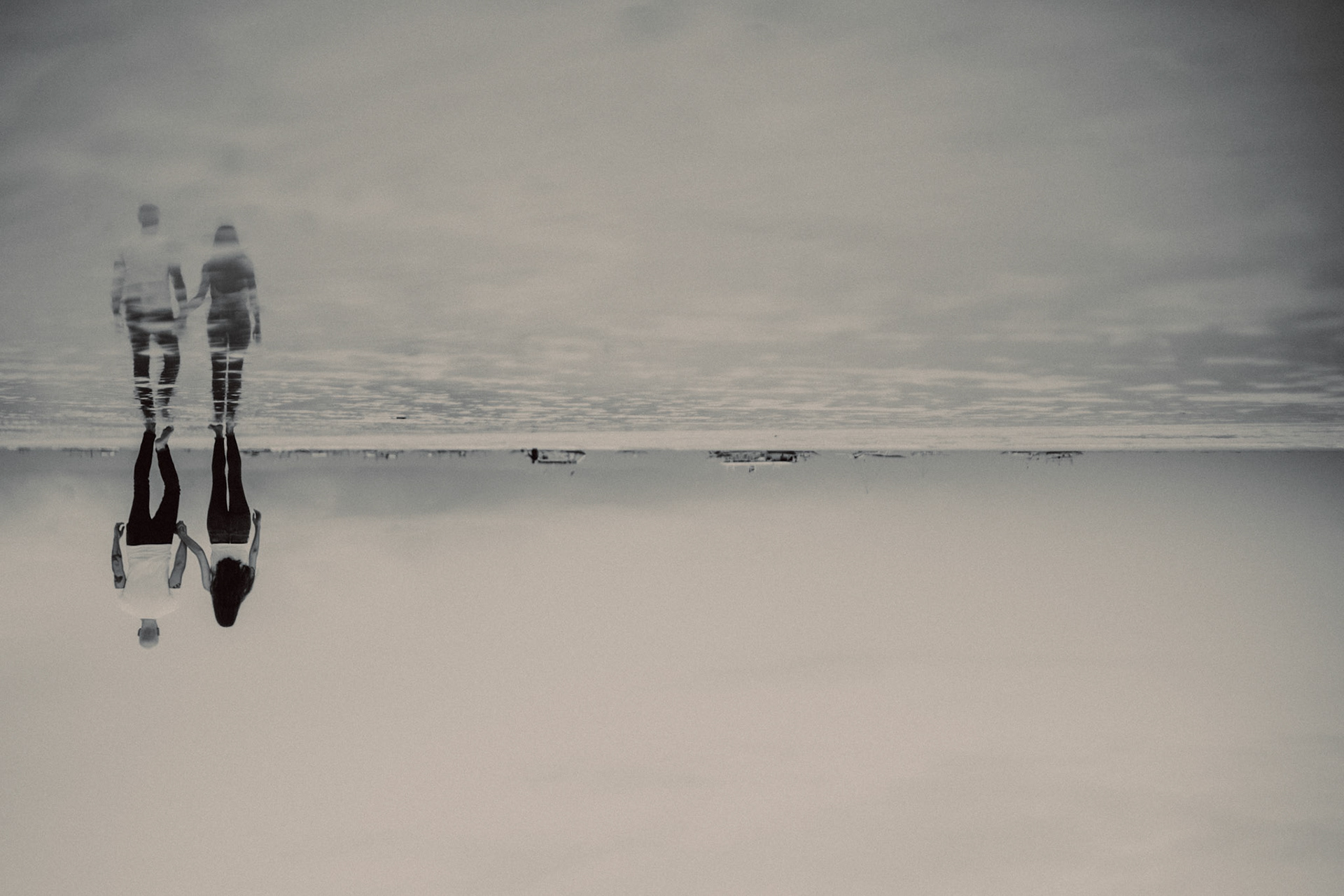 Creative destination couple portraits at White Beach Station 1, in black and white, shot in front of Discovery Shores, Boracay, Philippines, Southeast Asia, December 2018, Sony A7III.