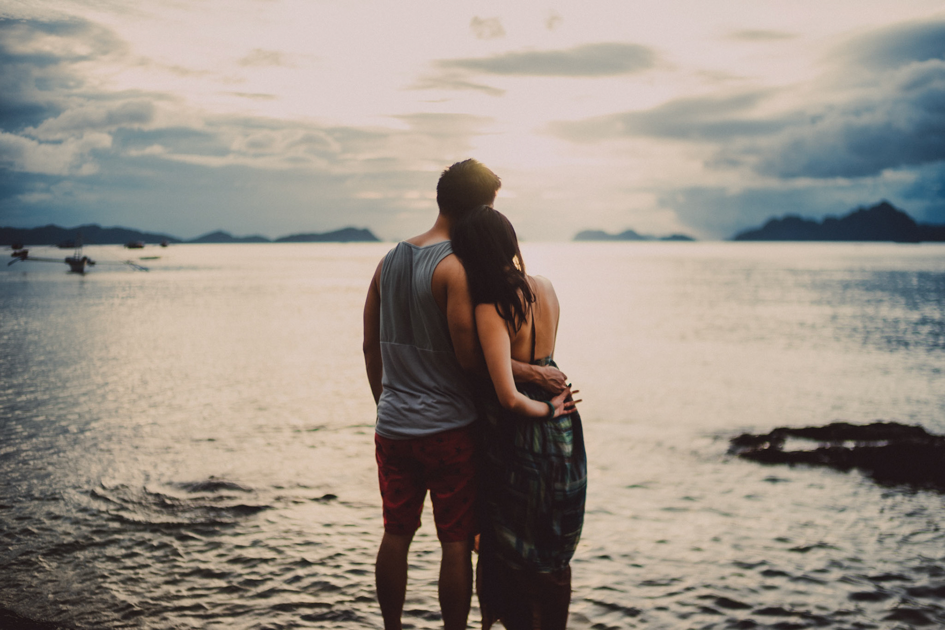 Blue hour couple portraits on a rocky coast, just below Republica Sunset Bar, from George and Allie's honeymoon portrait shoot, Corong-Corong Beach, El Nido, Palawan, Philippines, Southeast Asia, December 2018, Sony A7III