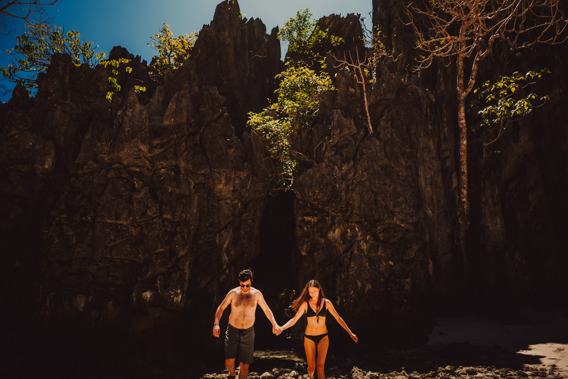 In front of a small cave on the south corner of Hidden Beach, Matinloc Island, El Nido, Palawan, Philippines, Southeast Asia, March 2020, Sony A7III.