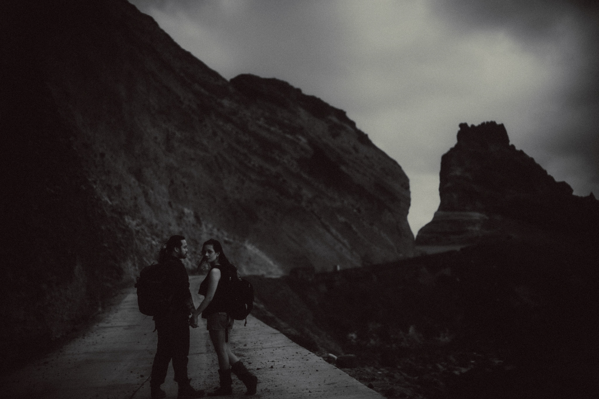 Backpacker adventure couple portraits at the Alapad Rock Formation, Batanes, Philippines, Southeast Asia, November 2014, Canon EOS 6D.