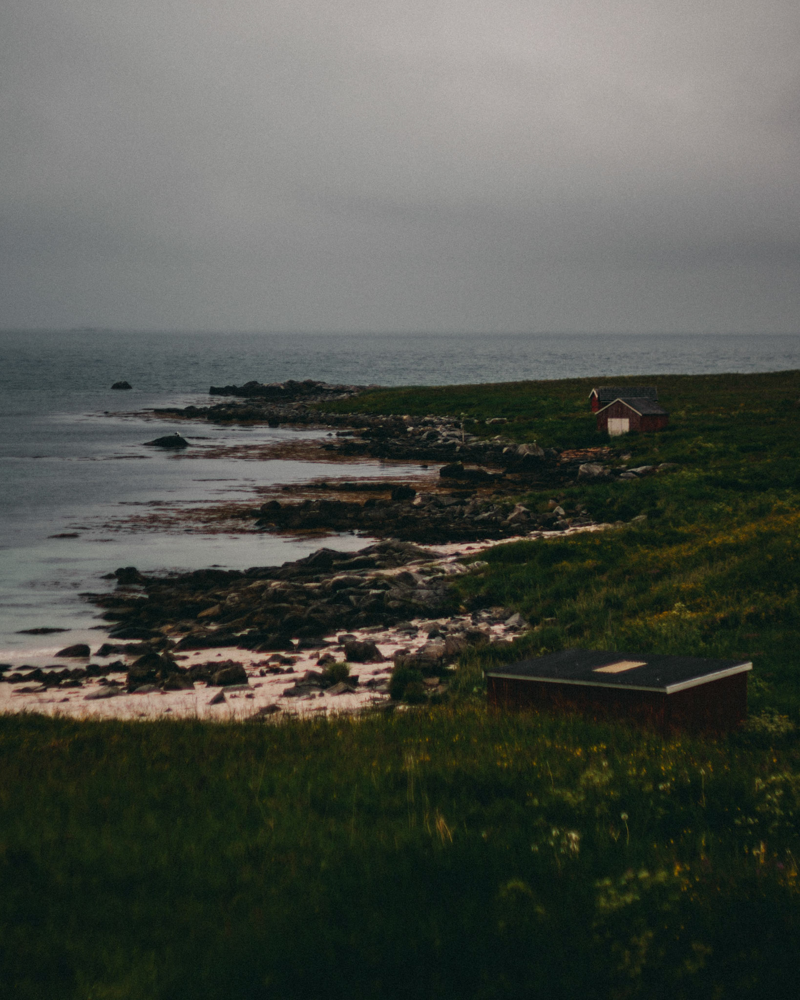 Red nordic cottages in Rambergstranda, Lofoten Islands, Norway, July 2016, Sony A7RII.
