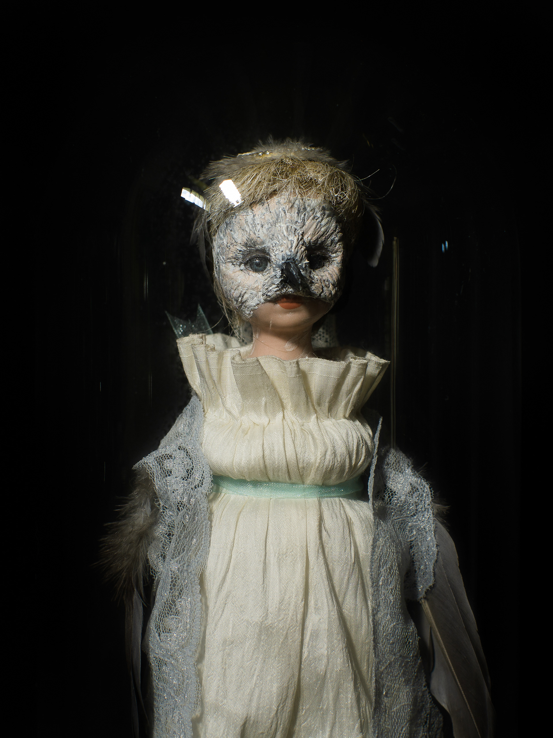 Mistaken Identity - Vintage doll, clay, feathers, silk, glass and brass bell jar on a wooden base. 28 x 15