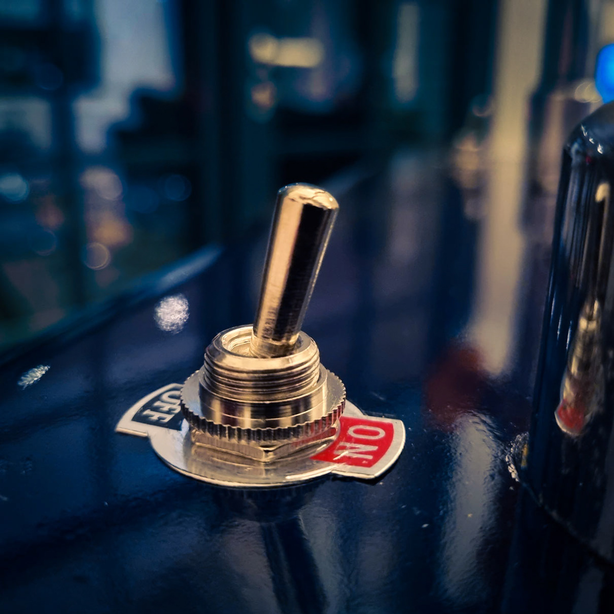 Vintage chrome toggle switches control each lamp independently