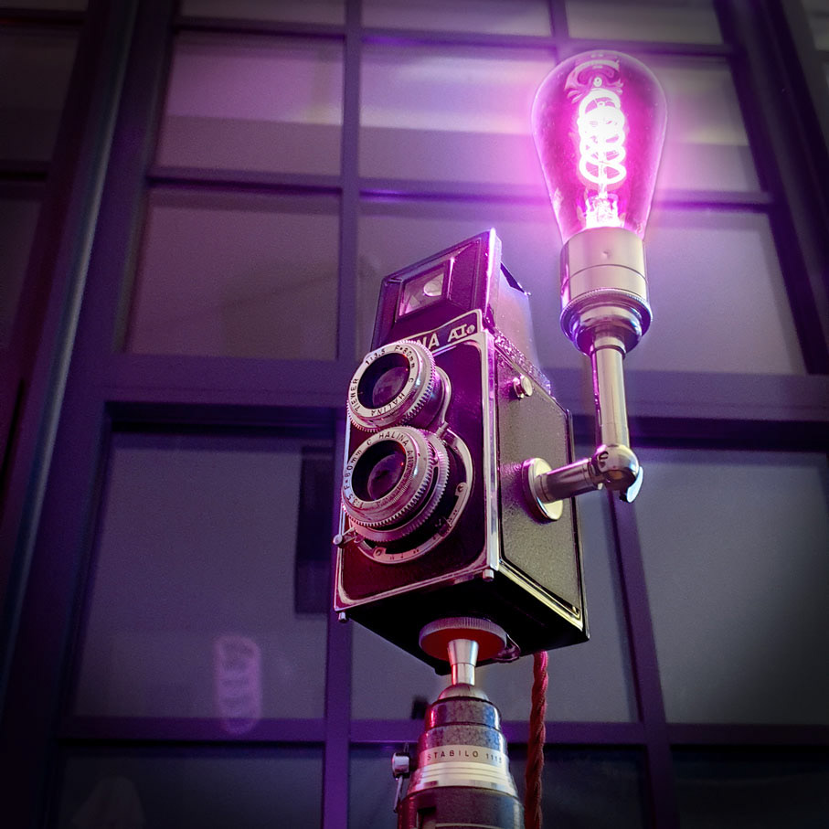 Vintage Halina A1 camera lamp with magenta filament bulb