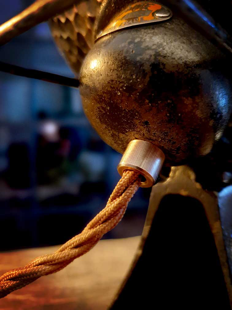 Copper cord grip with vintage braided cable