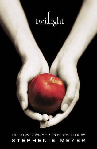 Book cover: A black background with pale hands holding a red apple.