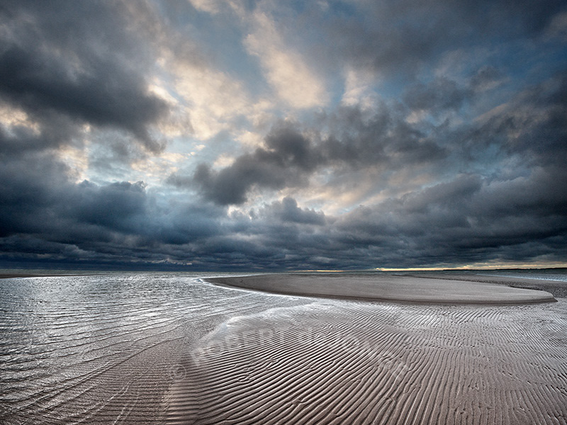 The shallows of Sturgeon Bay which is part of Wilderness State Park. Stormy Skies, Ripples in the sand, sandbar