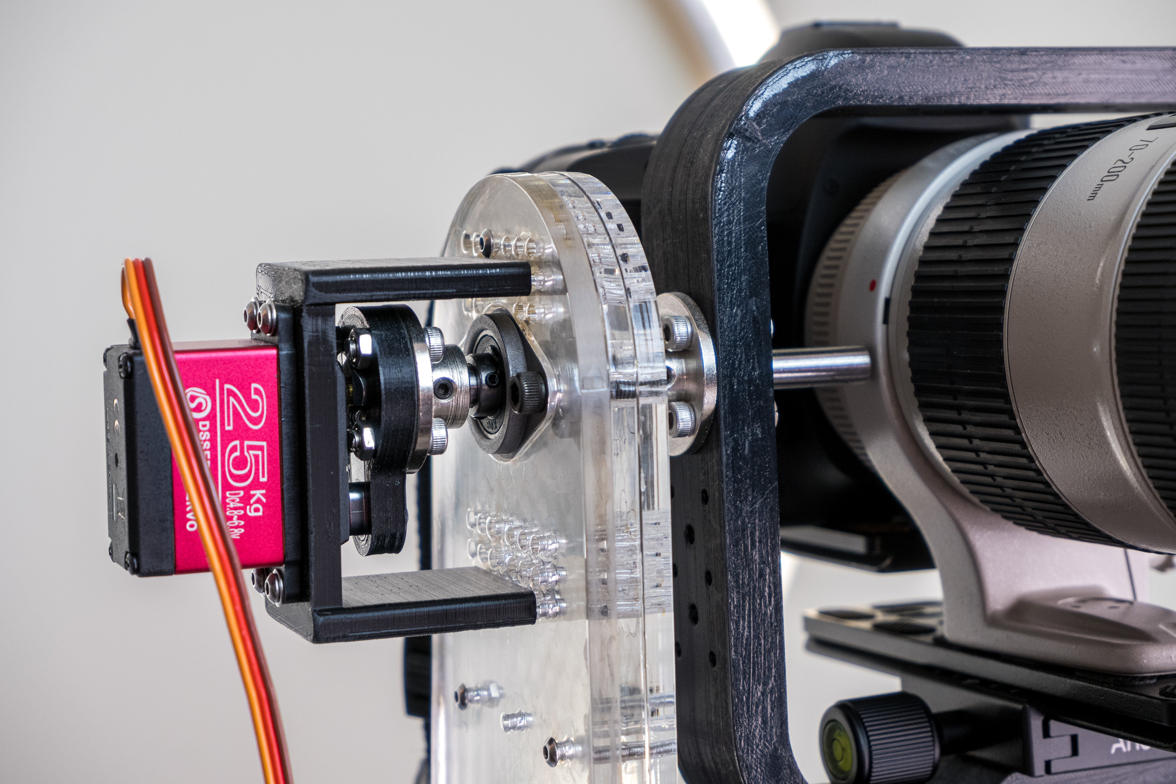 Top Servo, along with the vertical stand and 3D-printed camera bracket. The servo and camera bracket are linked together through a series of shaft couplers.