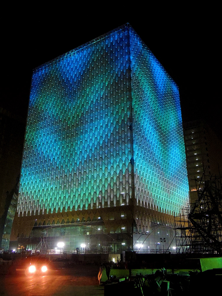 A tower with lighting design on-site in Saudi Arabia. Artwork by Ria Ama. (Photo: StandardVision)