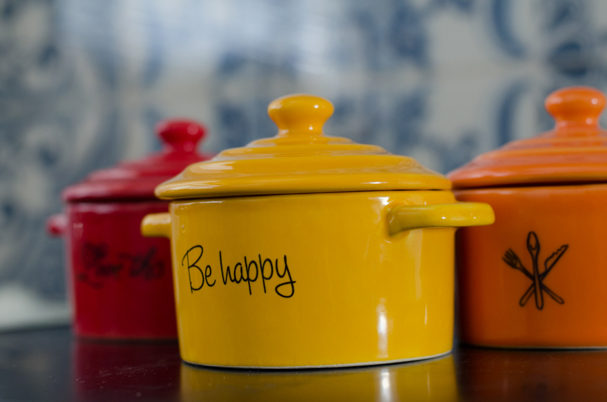 Customized mini casseroles in red, orange and yellow.