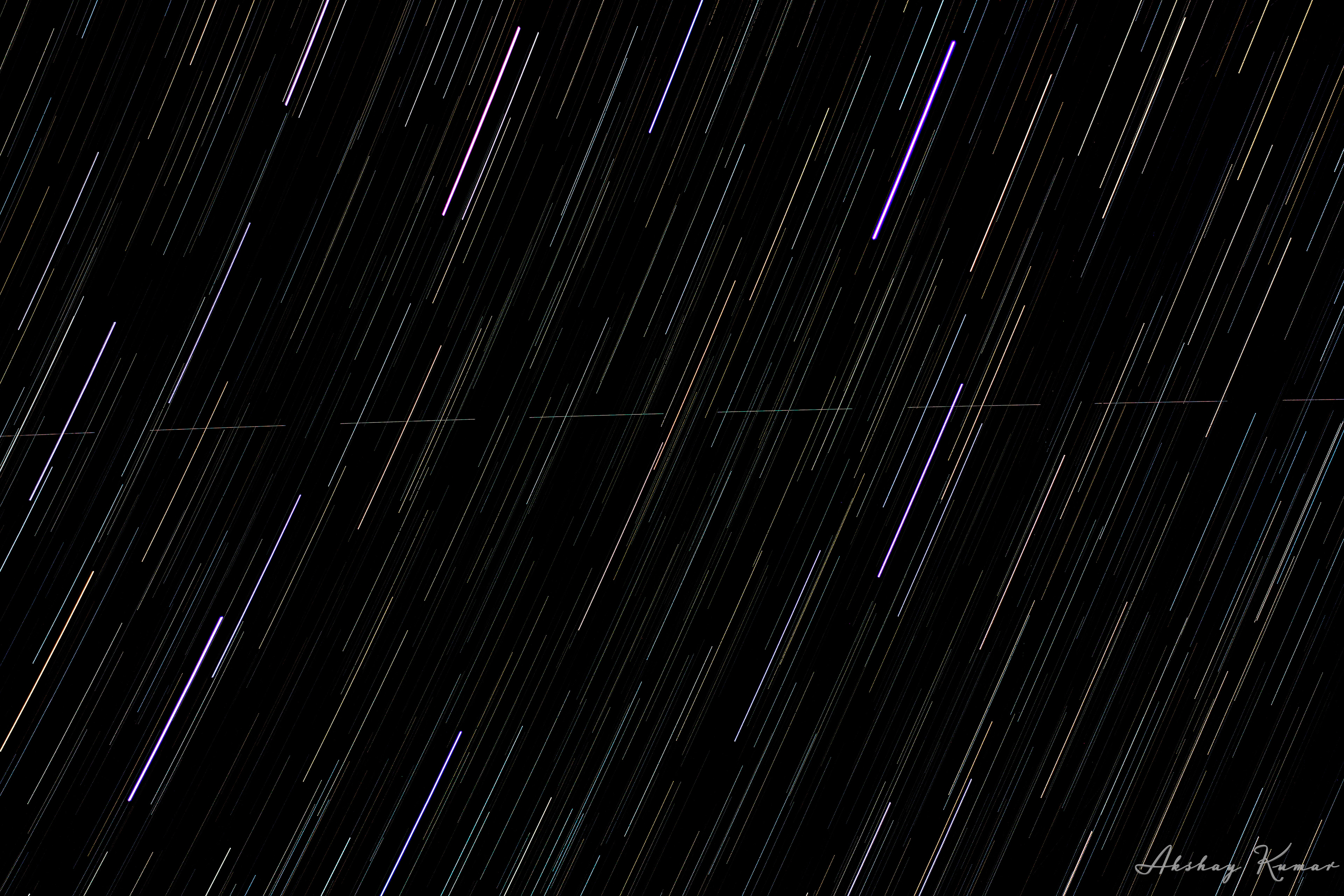 Close view of Leo constellation in night sky. Brightest stars in the frame include 60Leo, 31Leo, ρLeo, γ2Leo, ηLeo, Adhafera (ζLeo),Chort (θLeo), Chertan, Algieba (γ1Leo), Zosma (δLeo), Regulus αLeo). Darting horizontally across the constellation is the artifical satellite GLOBSTAR M004.