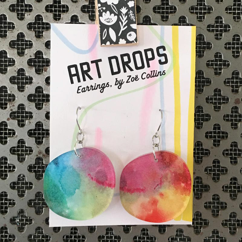 Rainbow ink lasercut acrylic earrings.