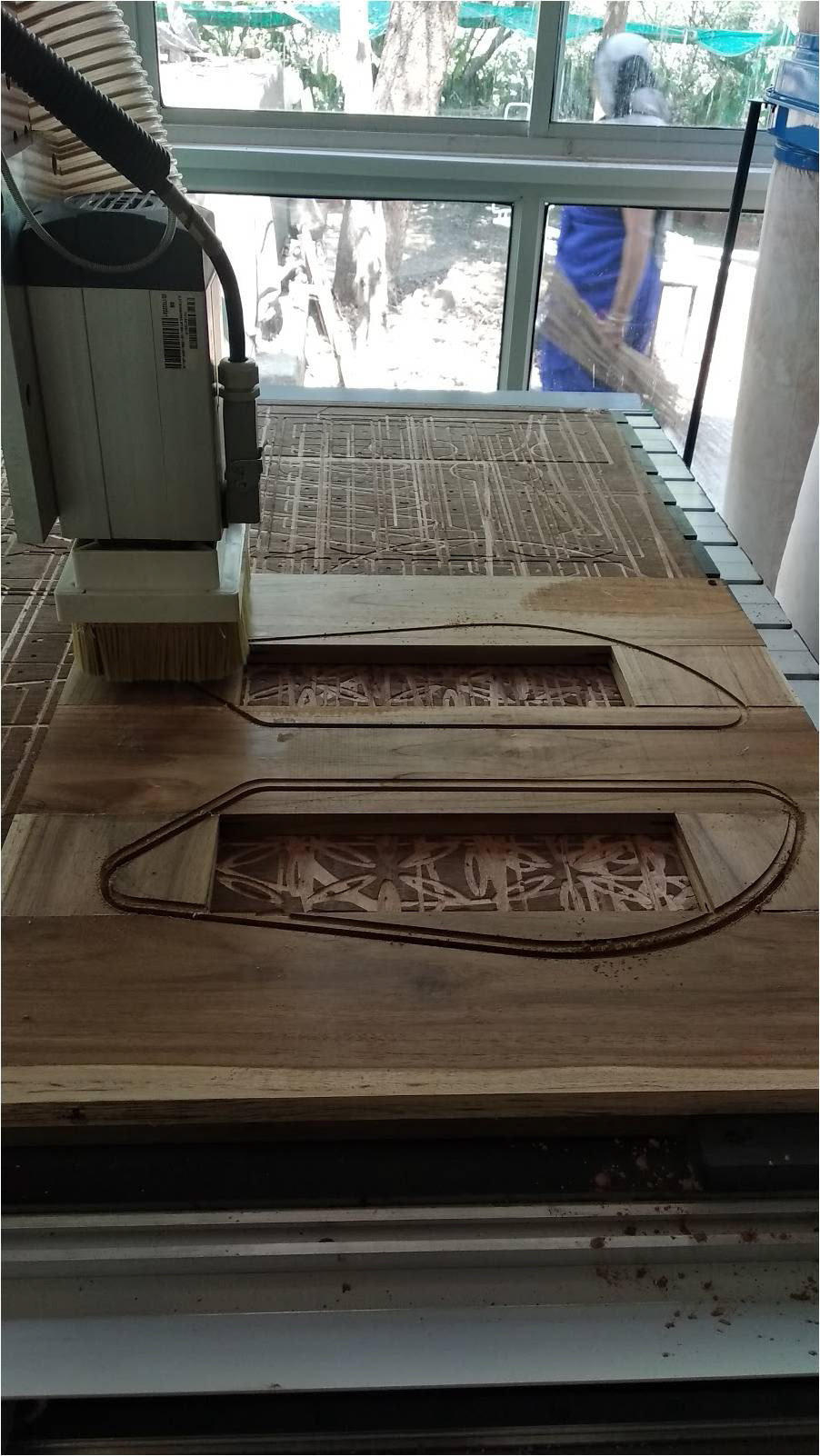CNC cut wooden table top parts.