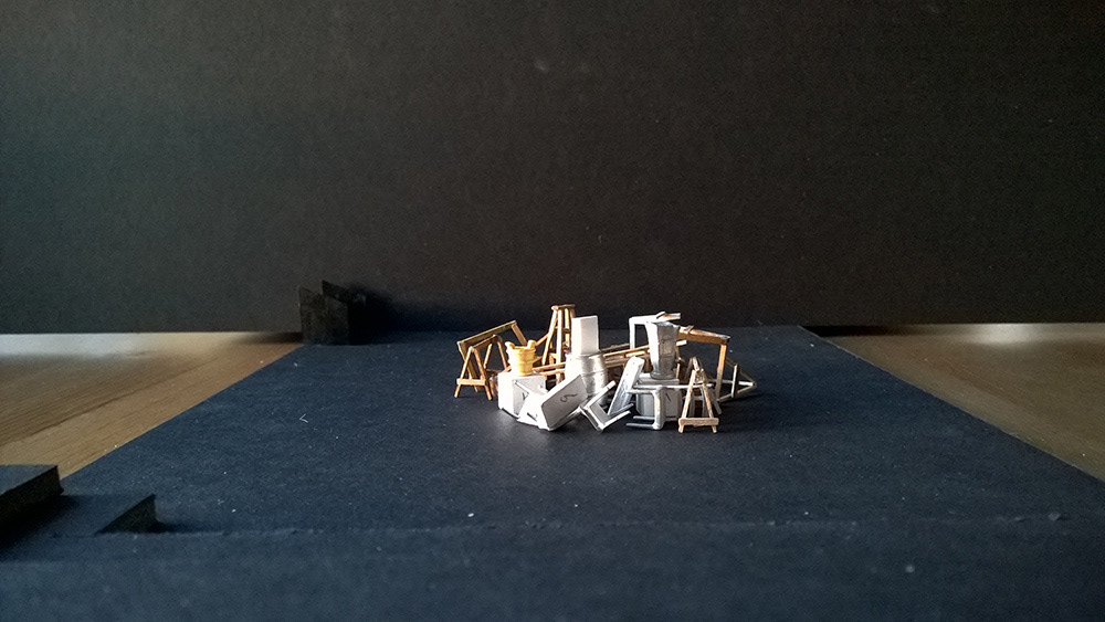 Preshow : The entire set consists of wooden ladders, sawhorses, suitcases, and barrels