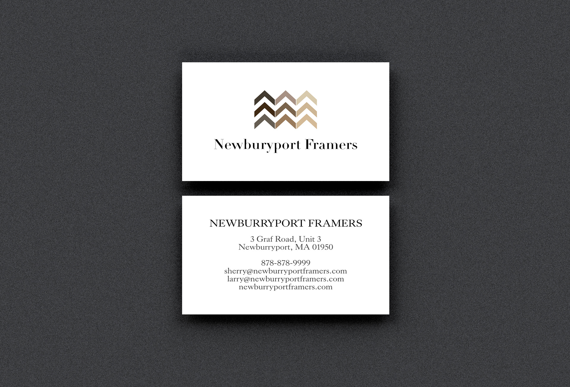 Business cards with logo centered on front and business information centered on back.