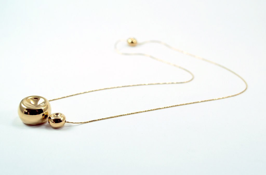 Collier 'Globule' double - Laiton doré à l'or fin 24 carats - 100€