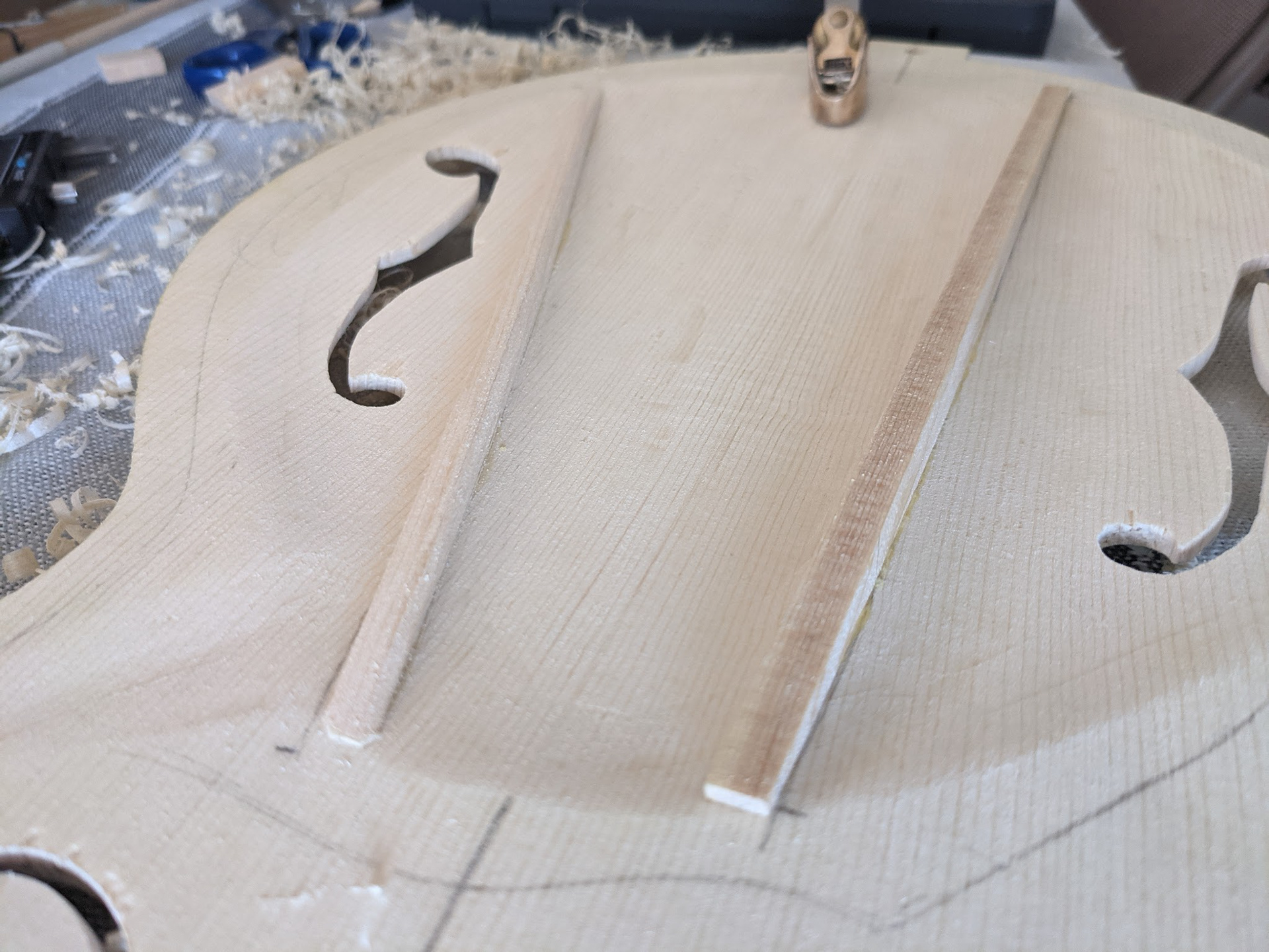 Left tone bar carved to shape, Right still raw.