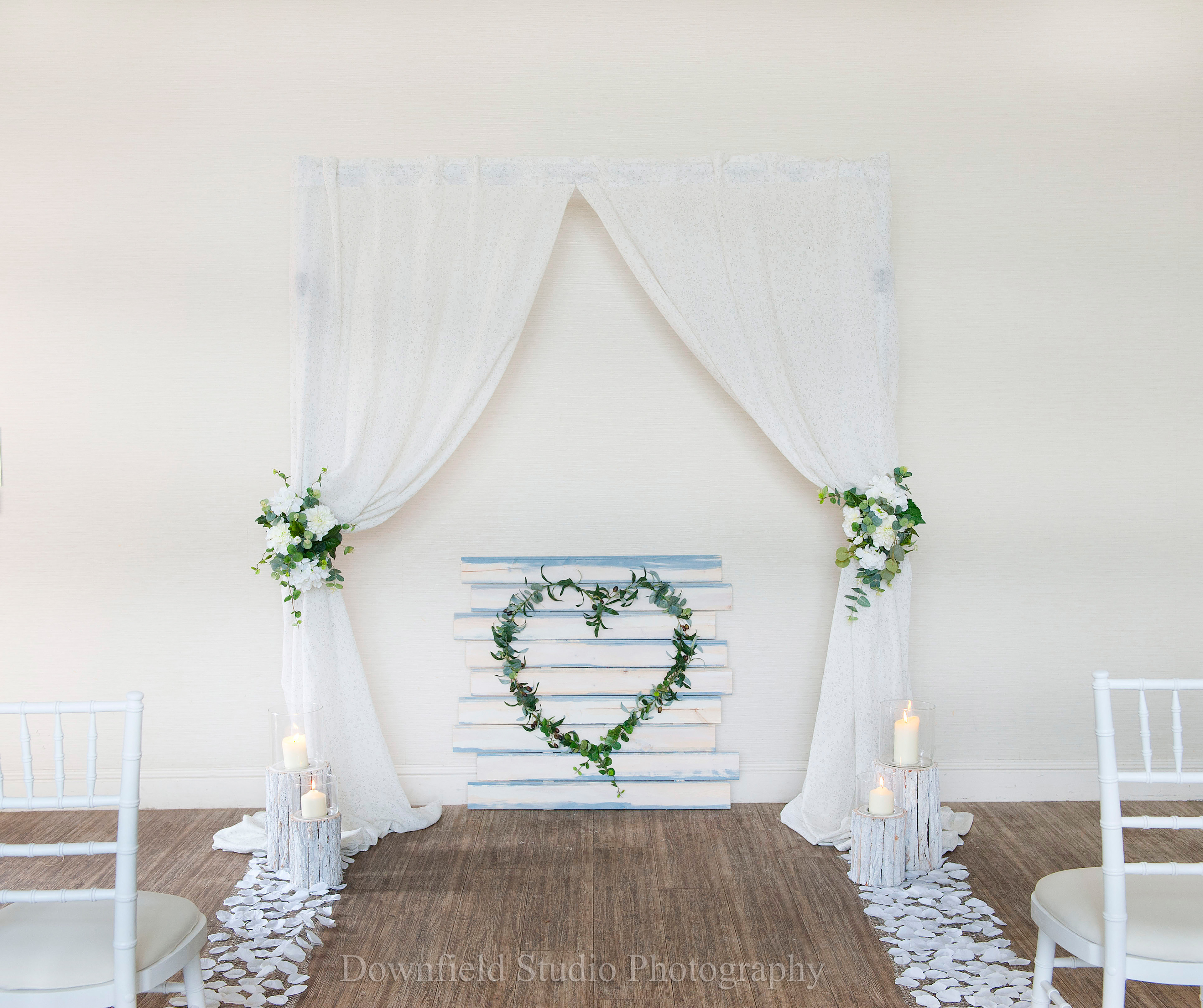 Draped Arch with small floral clusters
