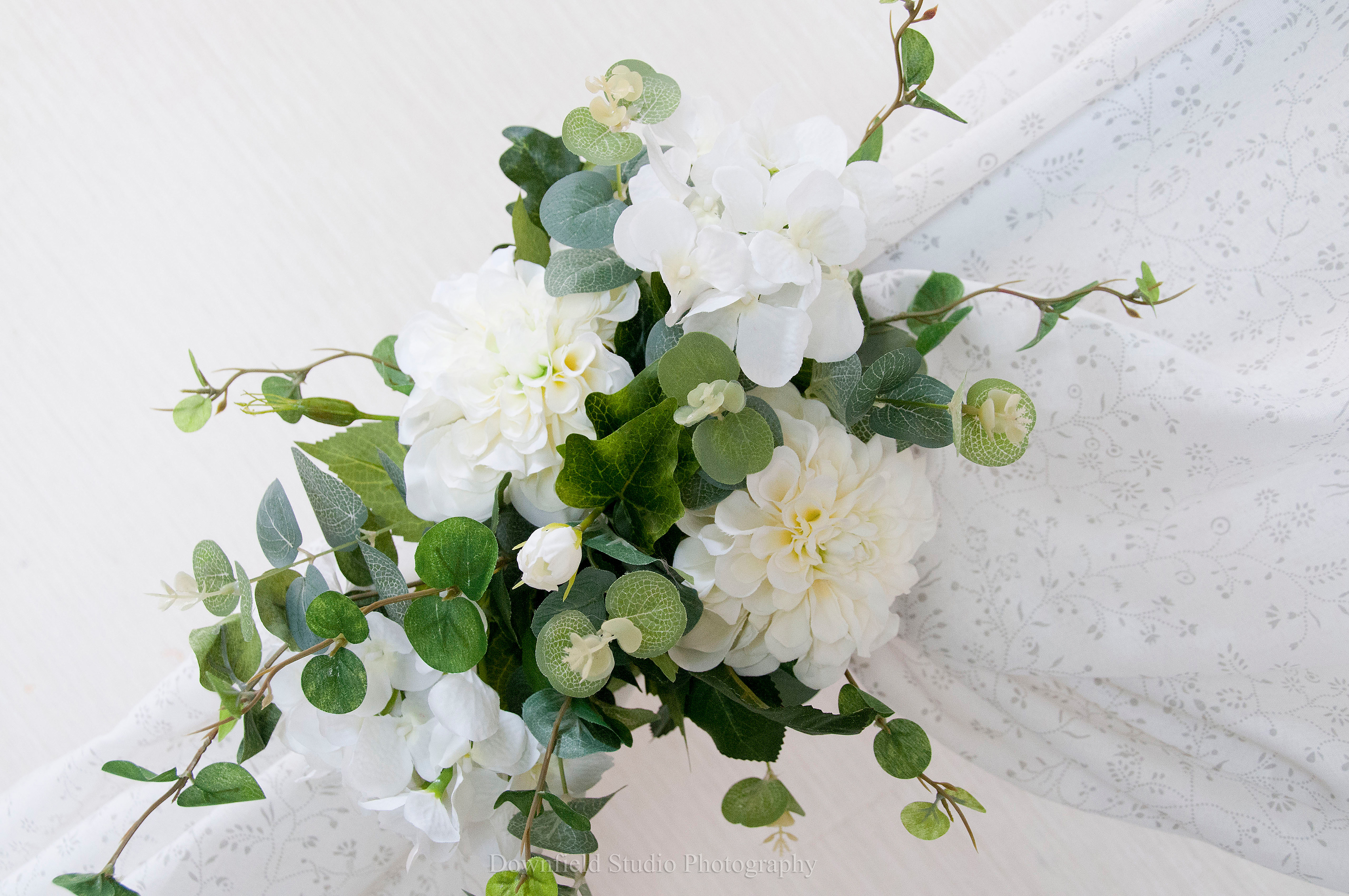 Draped Arch floral cluster