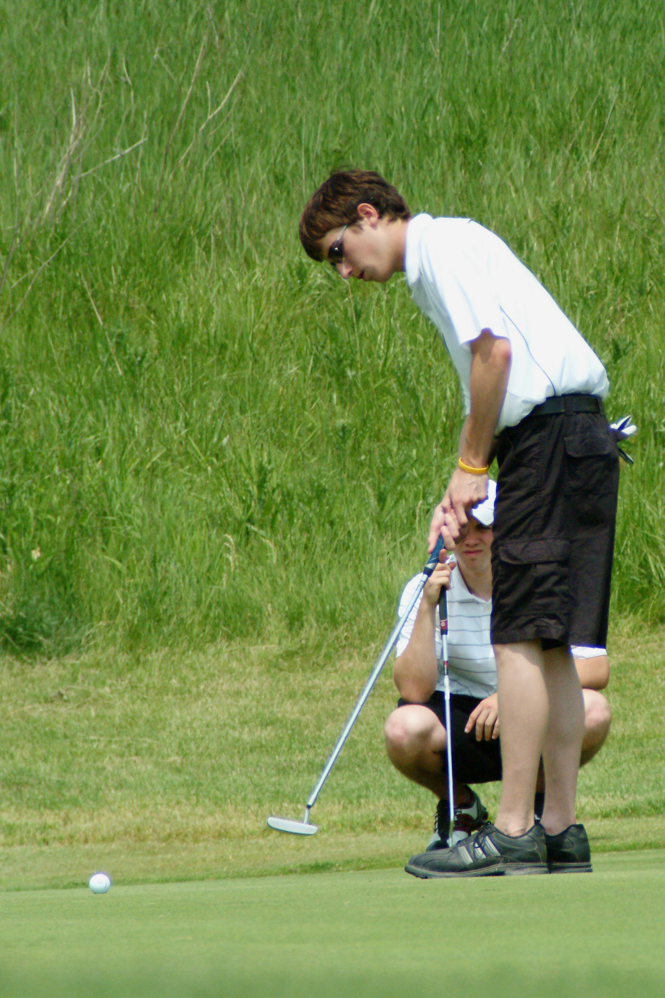 052309tvmBBGLFLCINVITE_8 Tony V. Martinv CEDAR LAKE-Griffith's Justin Phillips. The Lake Central invitational on Saturday at Palmira.
