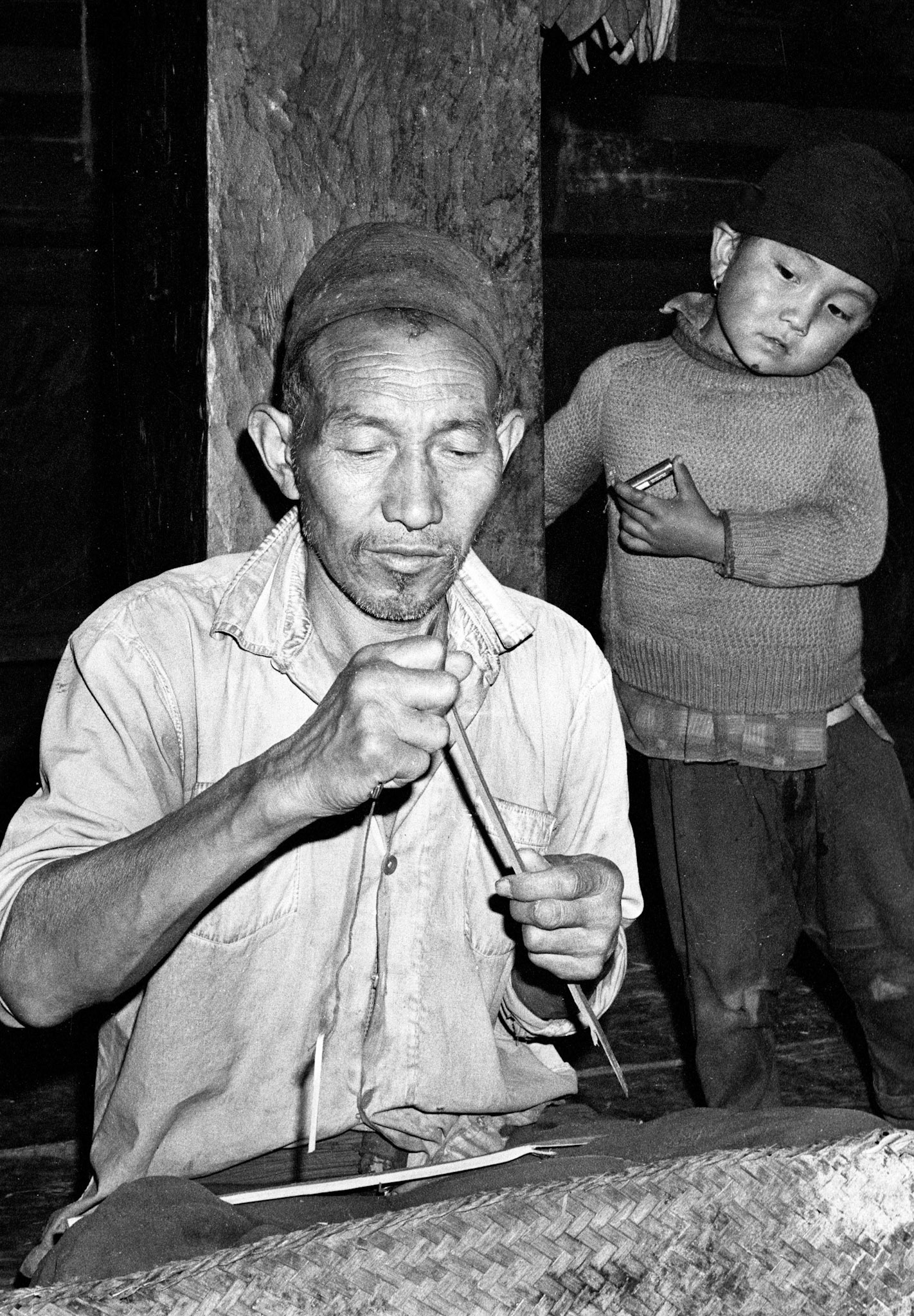 (L-R) Gin Gyau, Tibetan (788); Singi Ghale (296), making torma