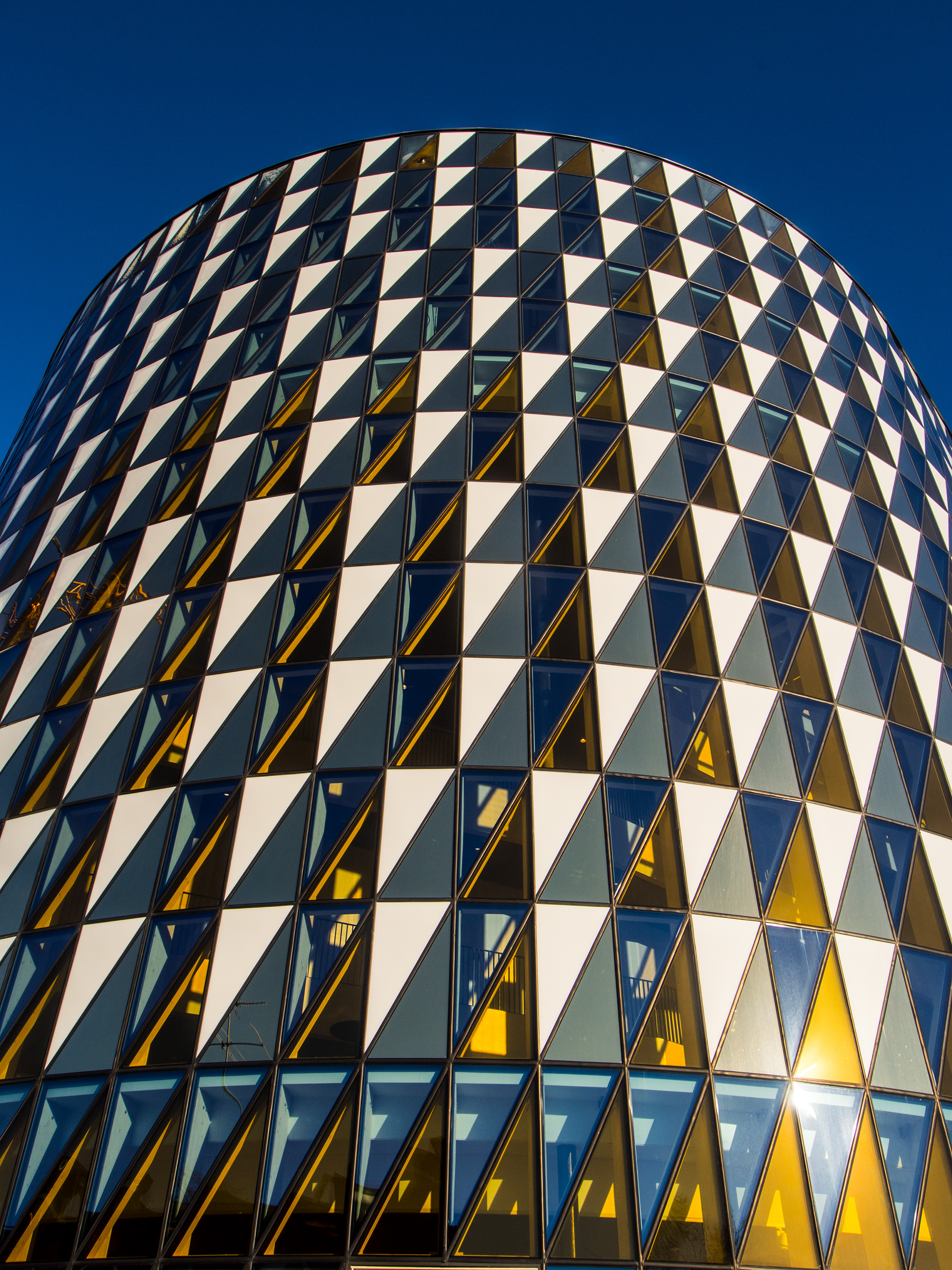 Karolinska Aula facade against a blue sky