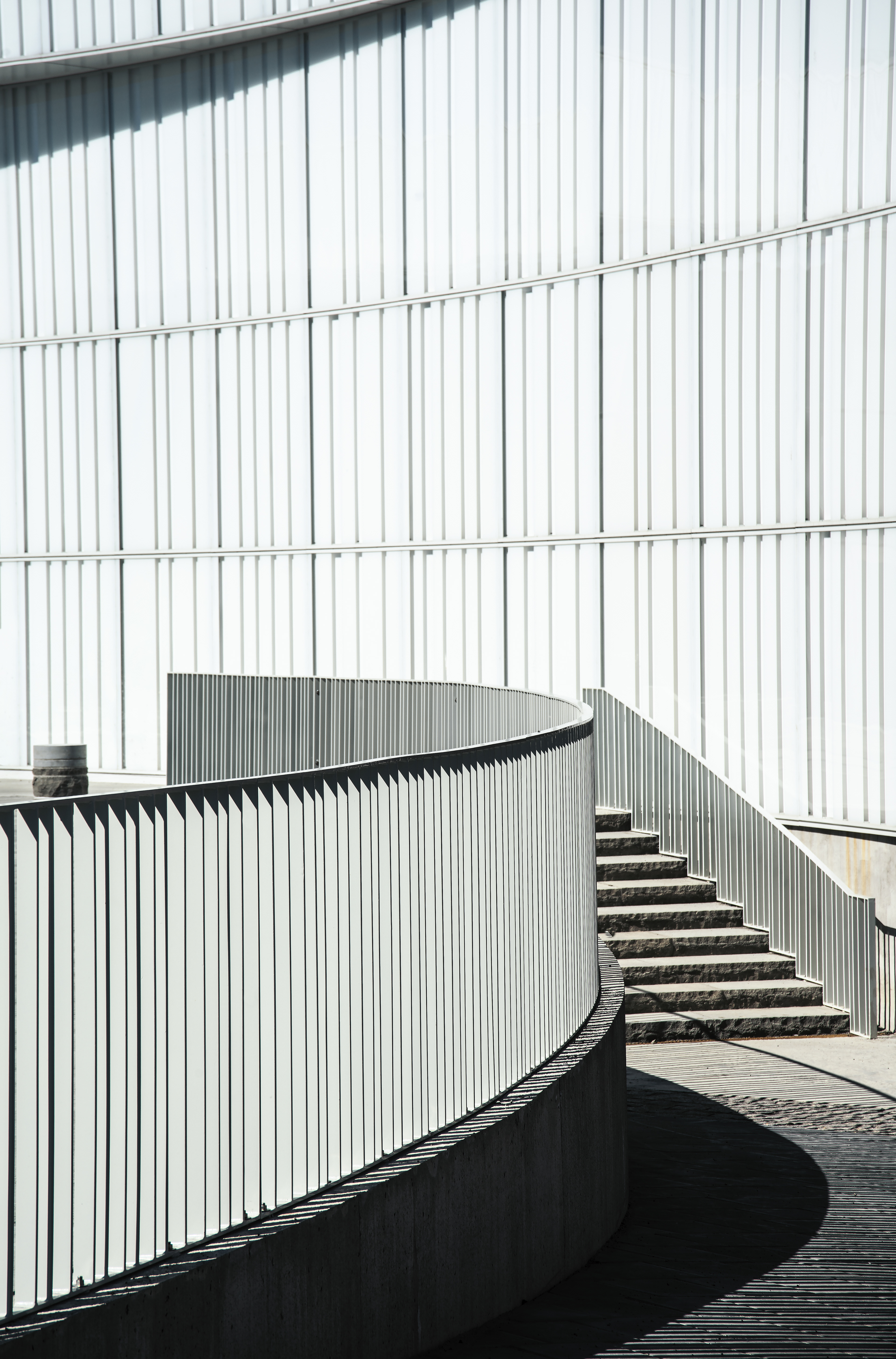White wall and railings plus some stairs