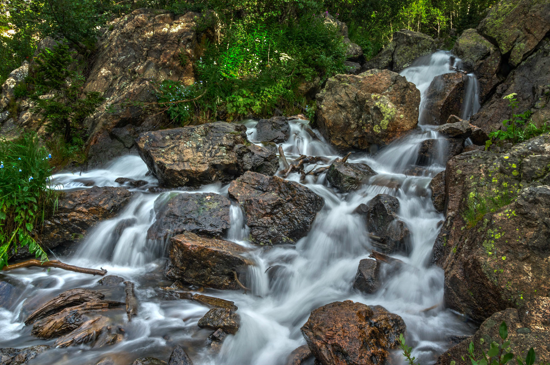 A small set of cascades on Tyndall Creek, near Dream Lake.Rocky Mountain National Park6 August 2014This is an HDR image consisting of 5 exposures merged in Photomatix Pro. Additional processing in Lightroom and Photoshop.PENTAX K-3, Sigma 18-250mm f/3.5-6.3 DC OS HSMISO 100 18 mm  0.4 sec at ƒ / 22Prints of my work are available from my website at http://www.fingolfinphoto.comFollow me on Facebook at http://www.facebook.com/fingolfinphoto or http://www.facebook.com/pesterleAlso, http://500px.com/pesterle   http://www.flickr.com/photos/fingolfinphoto