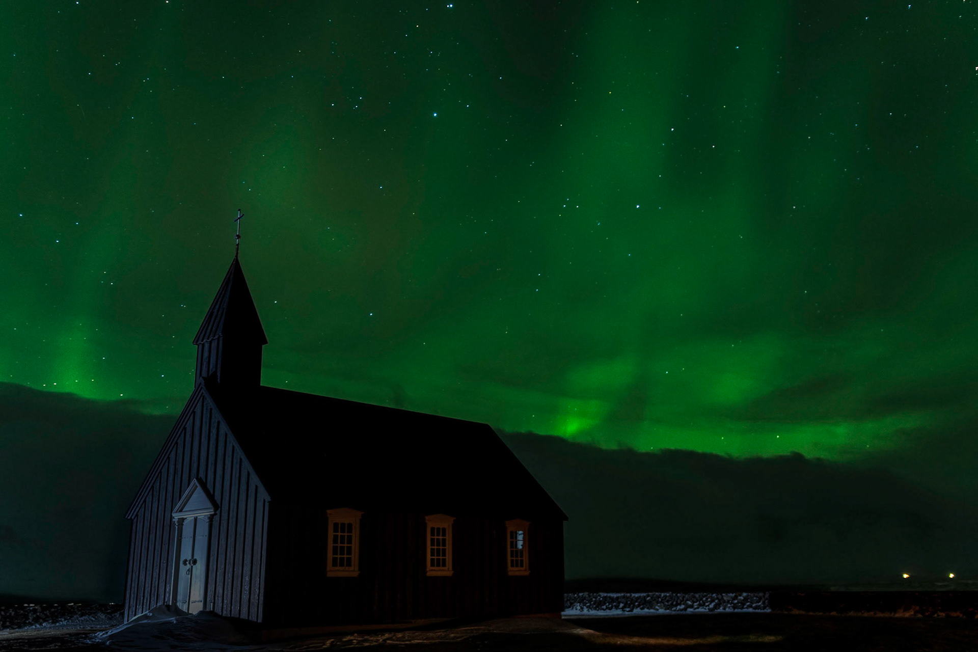 The northern lights over Buðirkirkja.  This is a composite of two exposures--one for the sky, and another for the foreground.Vesturland, IcelandFebruary 6, 2016PENTAX K-3, Sigma 18-35mm f/1.8 DC HSM ArtISO 800 18 mm  8.0 sec at ƒ / 1.8