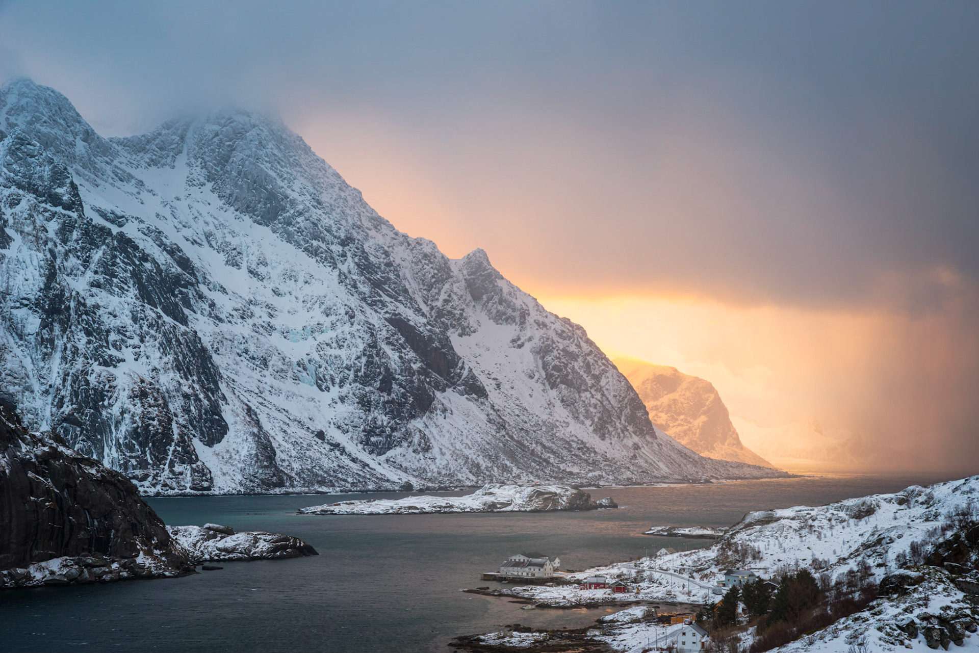 In between bouts of intense snowfall, the sun managed to poke through the clouds, just before sunset.Bøstad, Nordland, NorwayMarch 18, 2018Pentax K-1, HD PENTAX-D FA 24-70mm F2.8ED SDM WRISO 100 60 mm  ¼ sec at ƒ / 11