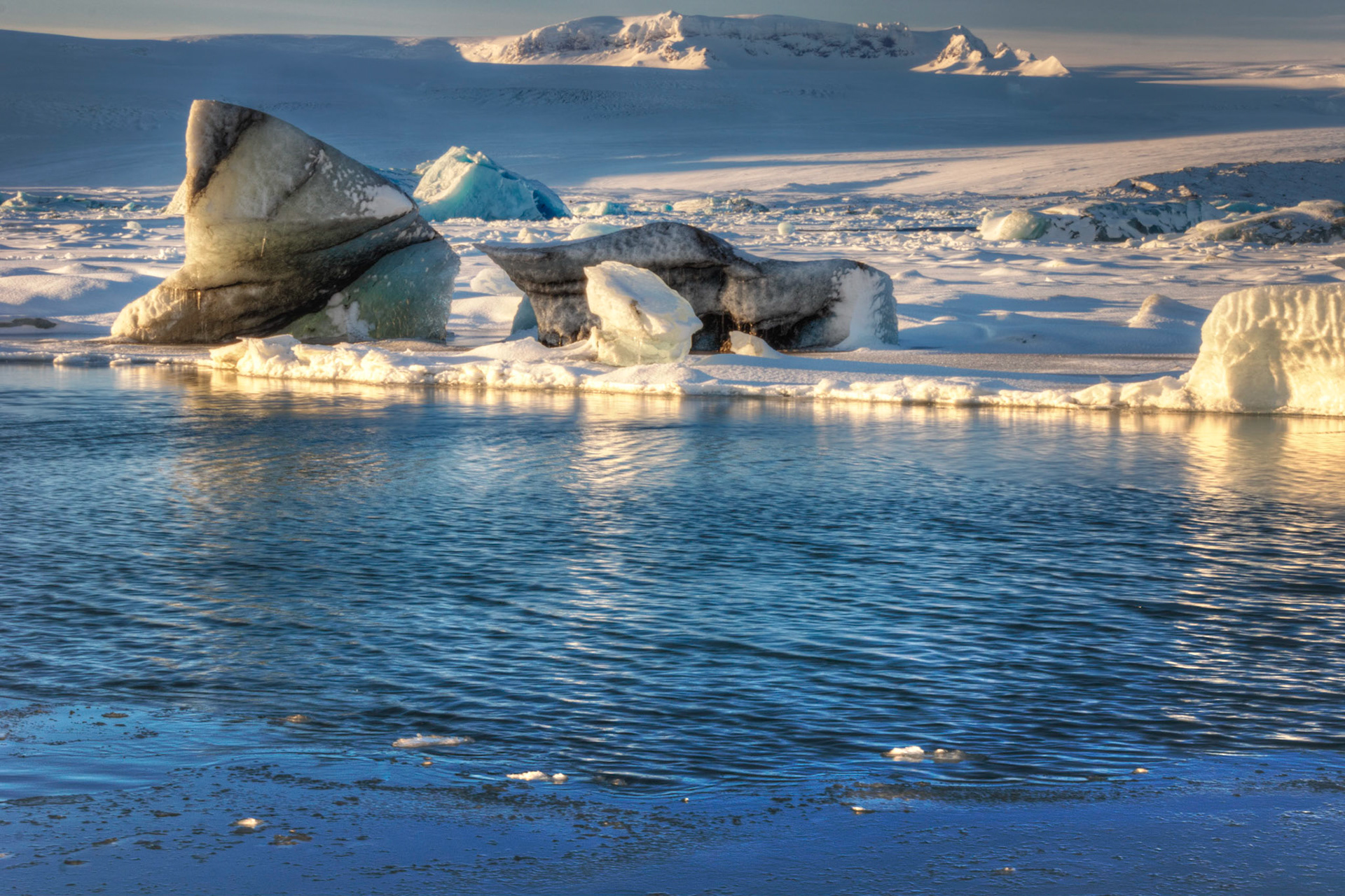 Ice in the glacial lagoon of Jökulsárlón.JökulsárlónFebruary 9, 2016This is an HDR image consisting of 5 exposures merged in Photomatix Pro. Additional processing in Lightroom and Photoshop.PENTAX K-3, Sigma 18-250mm f/3.5-6.3 DC OS HSMISO 100 53 mm  0.4 sec at ƒ / 18