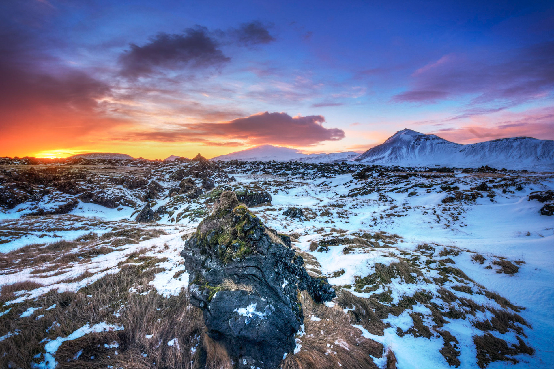 Sunset near Búðirkirkja on the Búðahraun lava fields of the  Snæfellsness Penninsula.Búðir, Vestrulund, IcelandFebruary 6, 2016This is an HDR image consisting of 5 exposures merged in Photomatix Pro. Additional processing in Lightroom and Photoshop.PENTAX K-3, Sigma 10-20mm f/4-5.6 EX DCISO 100 10 mm  ⅕ sec at ƒ / 16