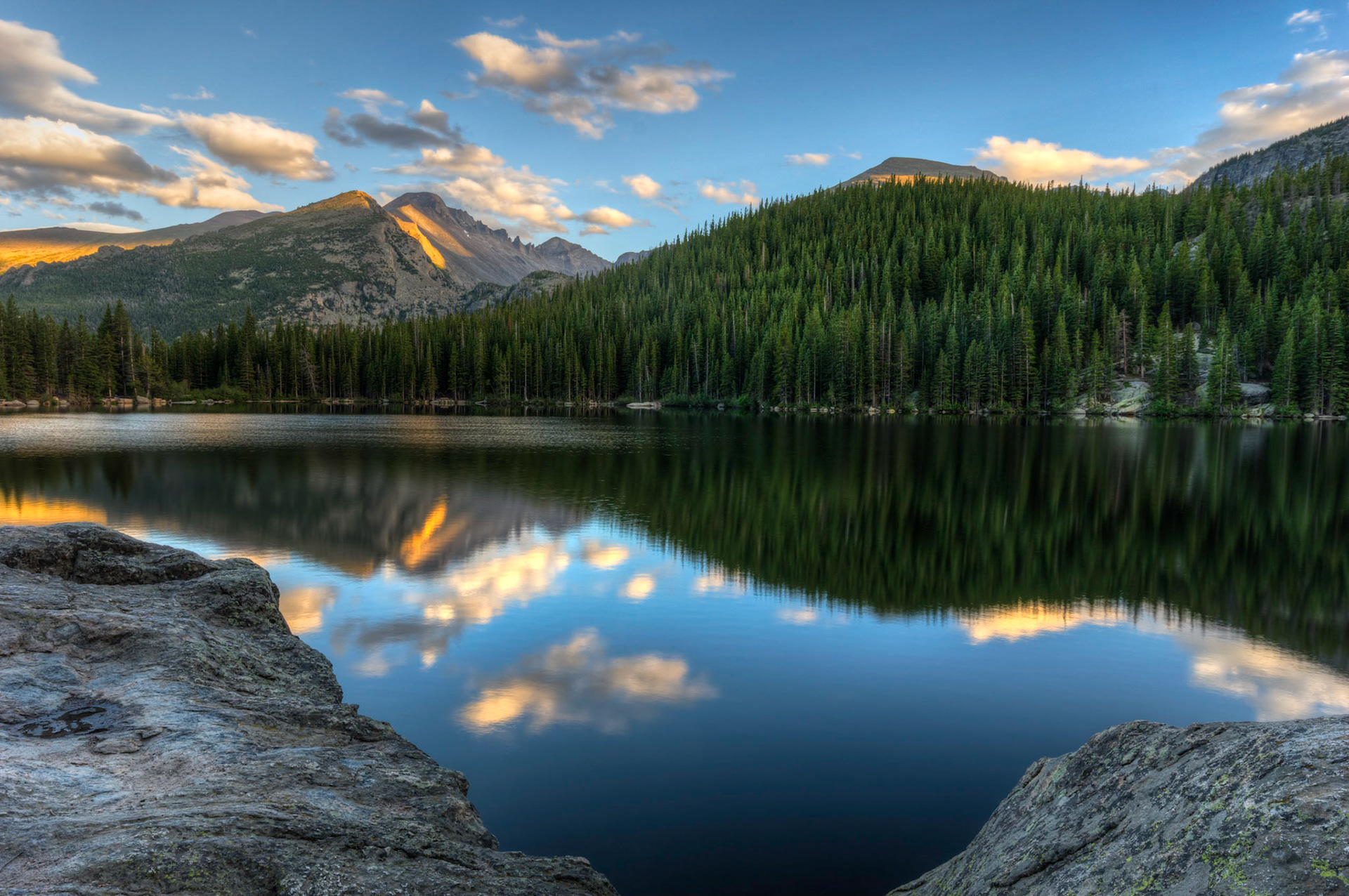 The late evening sun illuminating parts of Longs Peak, viewed from the north shore of Bear Lake.An HDR composite of 5 bracketed exposures merged in Photomatix Pro.  Additional processing in Lightroom and Photoshop.Rocky Mountain National Park6 August 2014PENTAX K-3, Sigma 10-20mm f/4-5.6 EX DCISO 100 16 mm  ⅙ sec at ƒ / 11Prints of my work are available from my website at http://www.fingolfinphoto.comFollow me on Facebook at http://www.facebook.com/fingolfinphoto or http://www.facebook.com/pesterleAlso, http://500px.com/pesterle   http://www.flickr.com/photos/fingolfinphoto