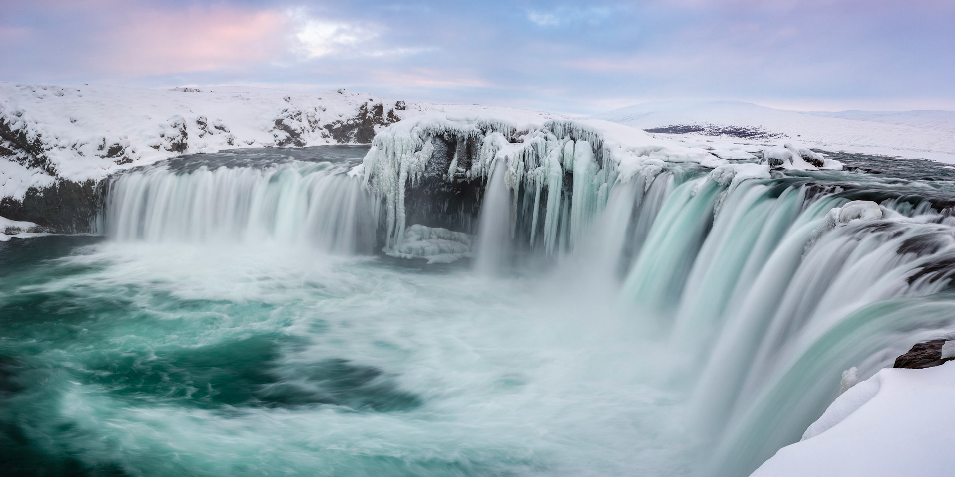 The Skjálfandafljót River, at Goðafoss.Norðurland Eyestra, IcelandMarch 12, 2018This is a panoramic images consisting of 5 frames stitched in Photoshop. Additional processing in Lightroom and Photoshop.PENTAX K-1, HD PENTAX-D FA 24-70mm F2.8ED SDM WRISO 100 45 mm  0.4 sec at ƒ / 16